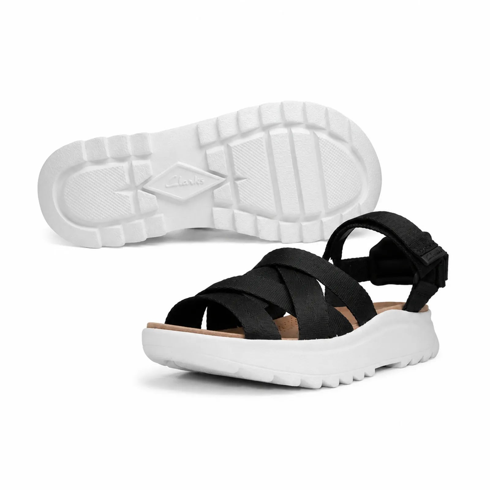 CLARKS DashLite Cross sandals pair with black straps and white textured outsole