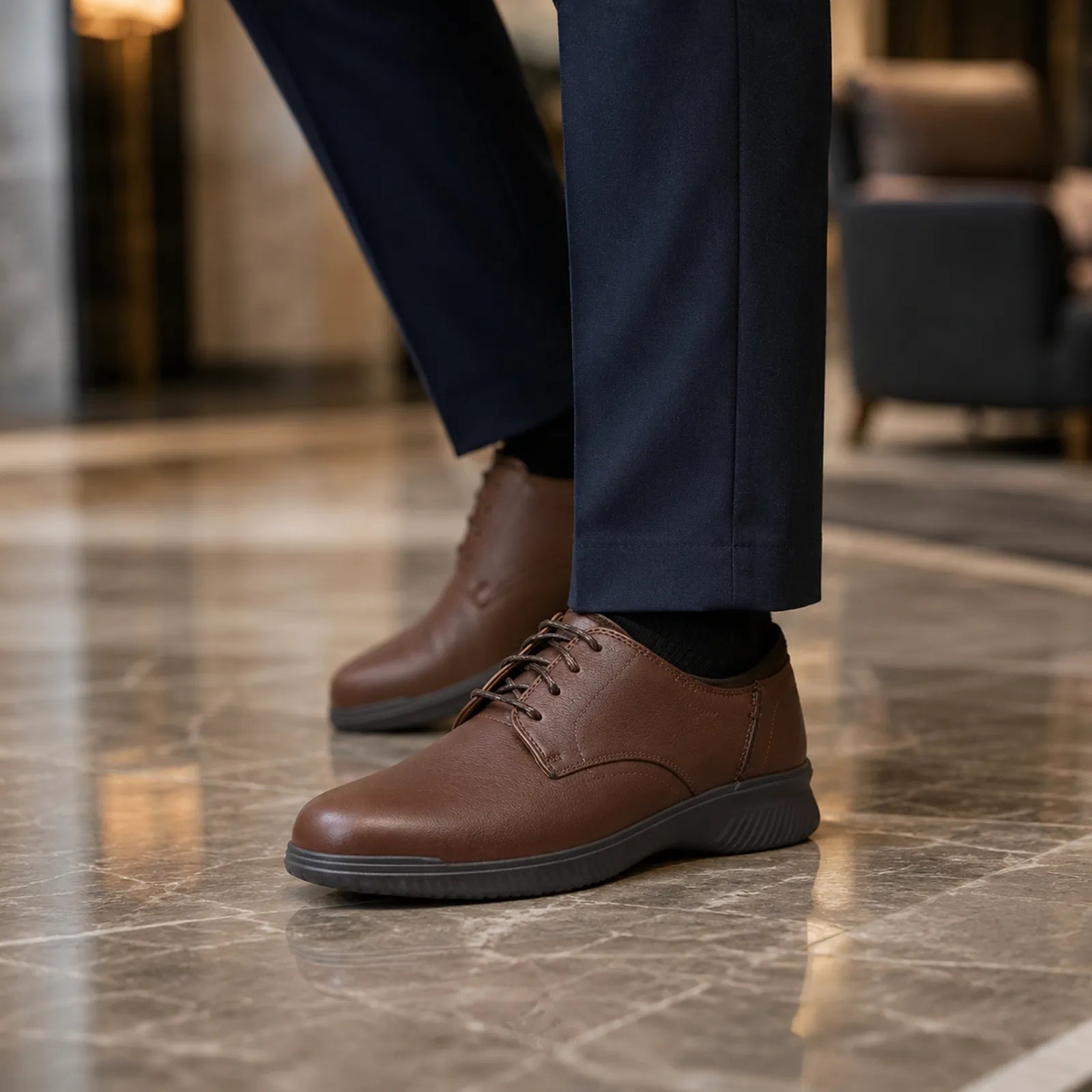 Mahogany leather lace-up business shoe with rubber sole, side view