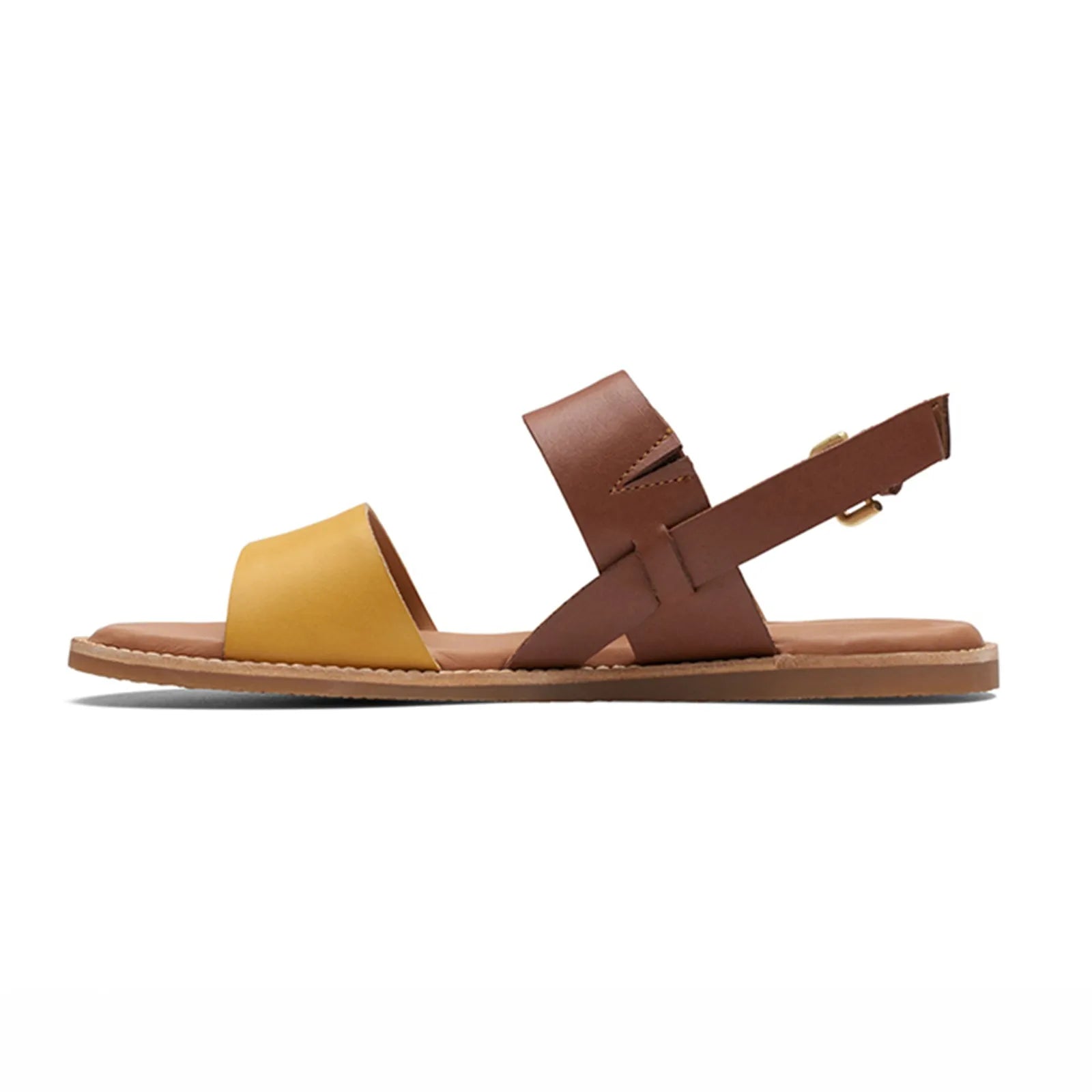 Women's yellow and brown flat sandals with crisscross straps and adjustable buckle