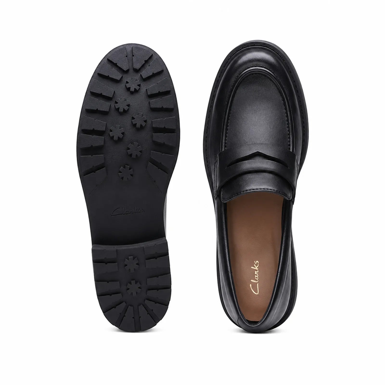 Women's black leather penny loafers, side profile with treaded rubber outsole