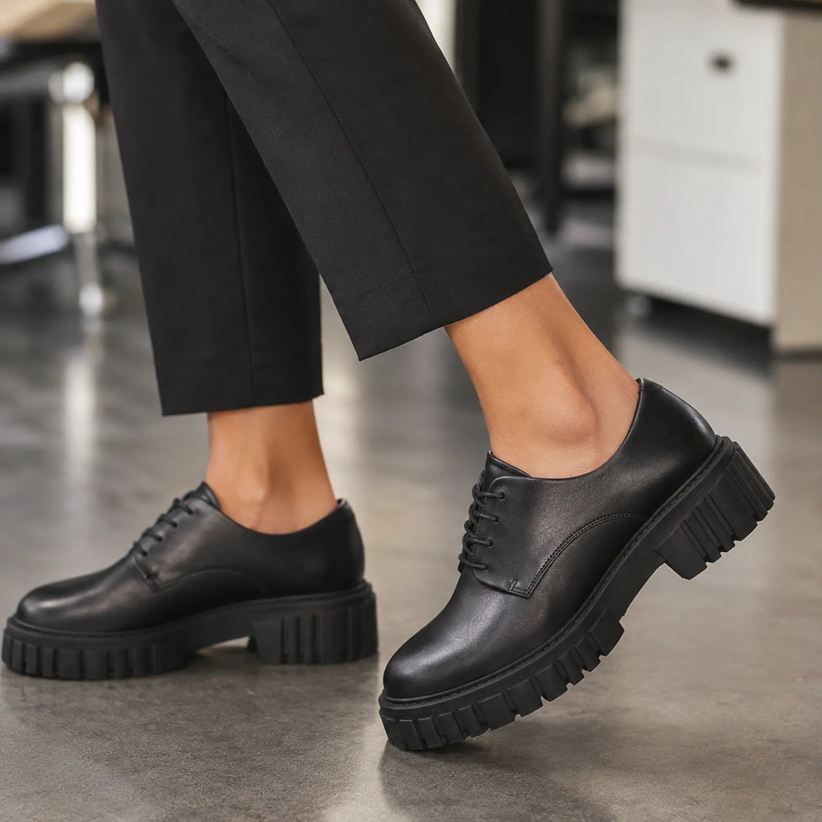 Women's black leather lace-up shoes with thick tread outsole and block heel