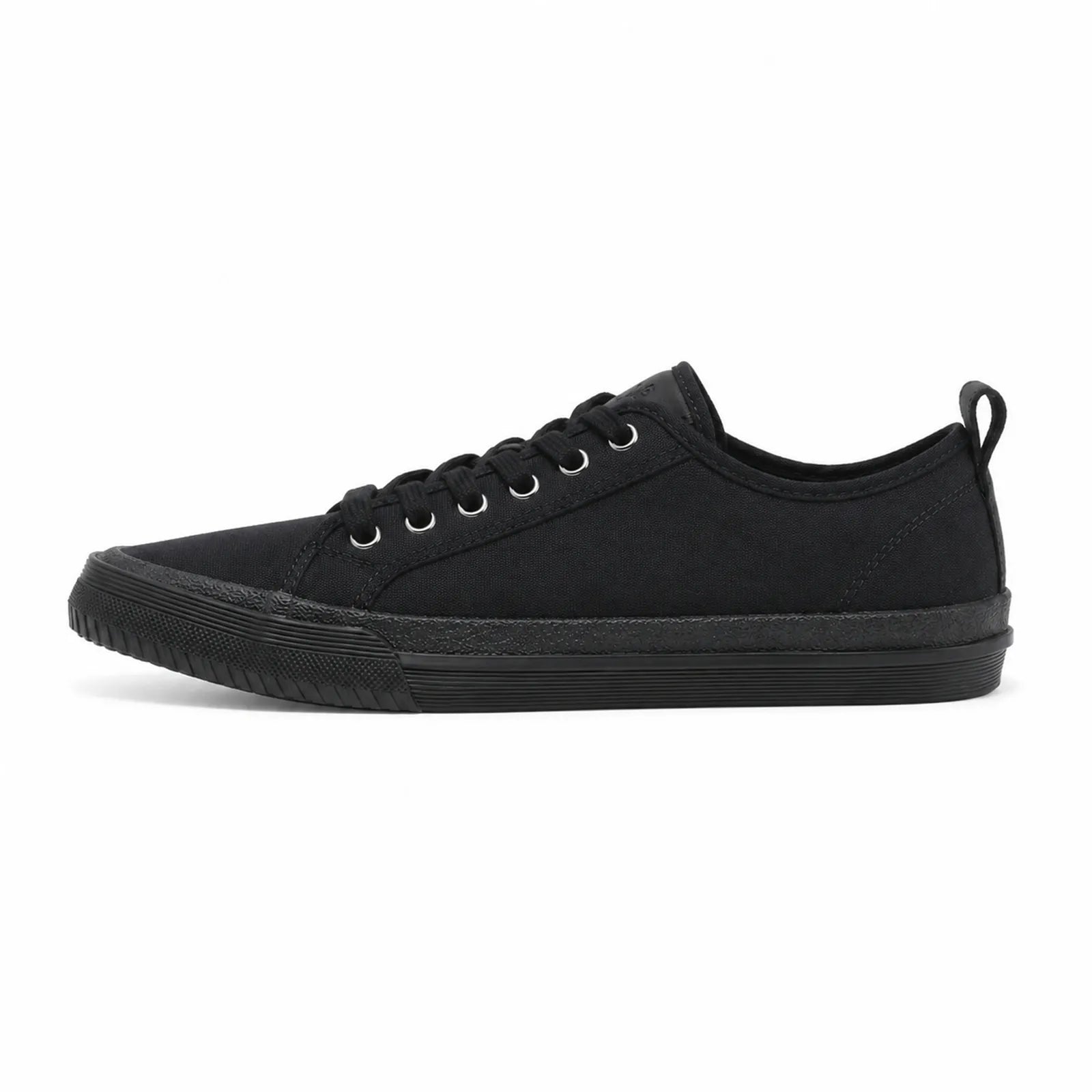 Black lace-up sneakers, side view, with padded collar and rubber toe cap