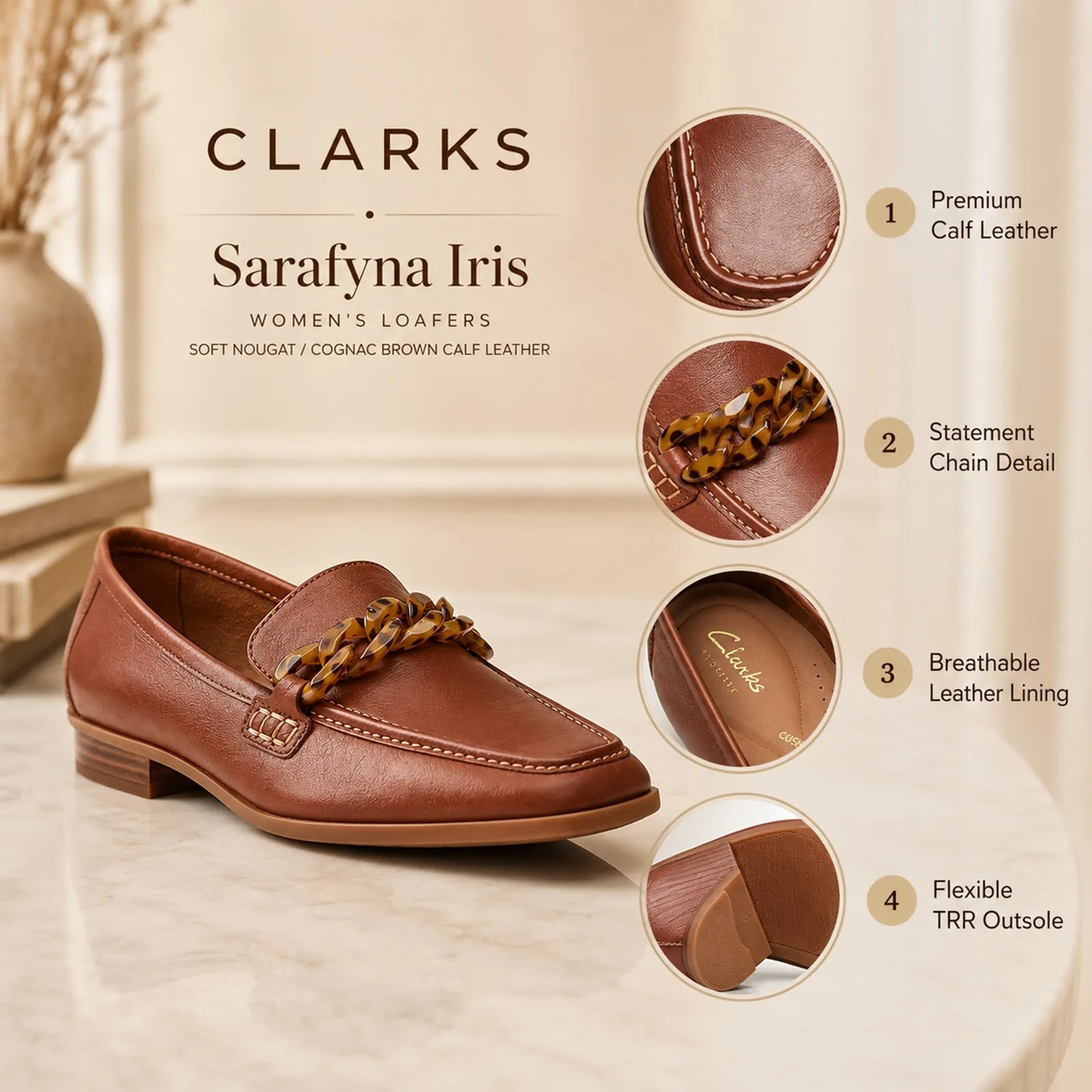 Brown leather women's loafers with chain detail and stitched moc toe