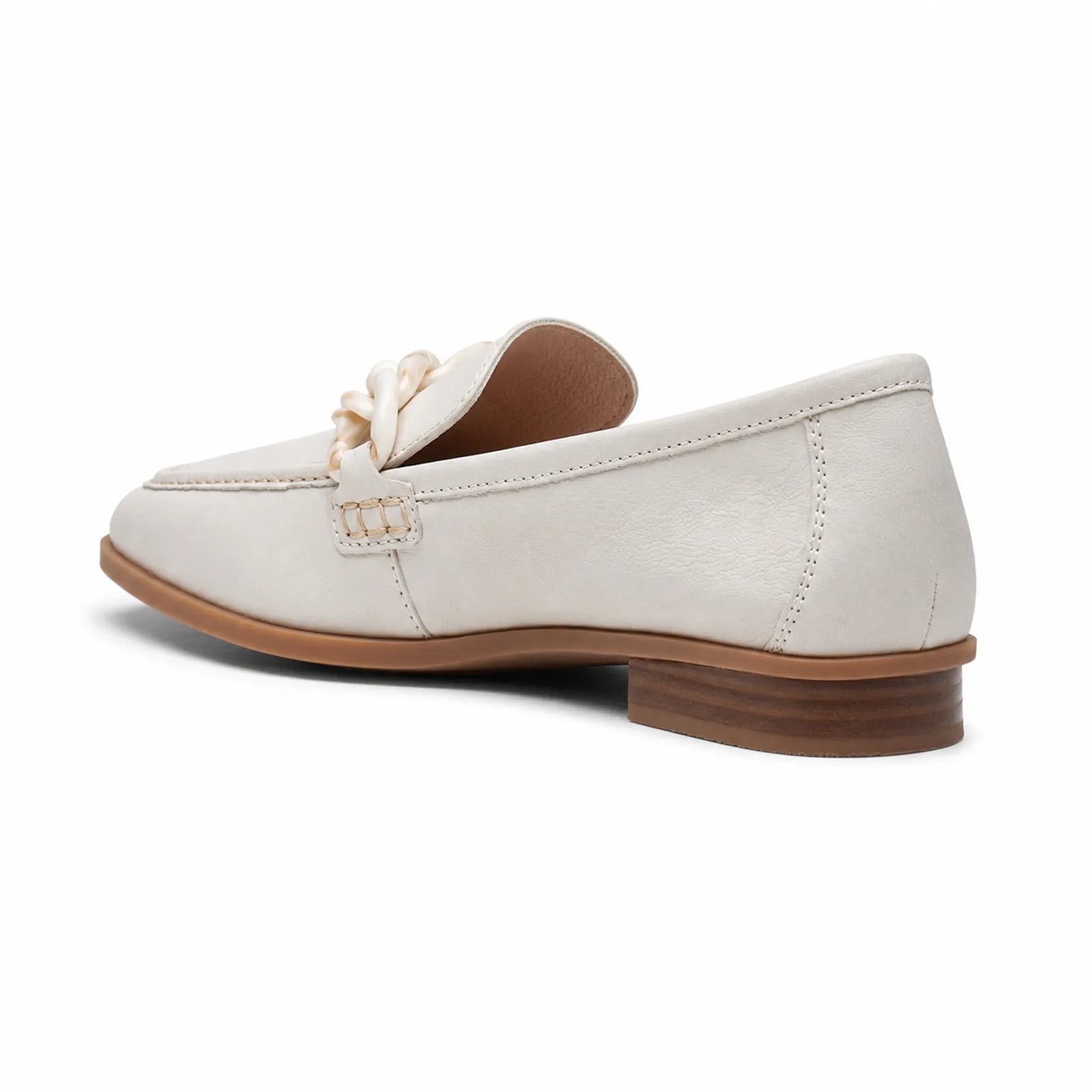 White leather loafer with braided chain detail and brown rubber sole.