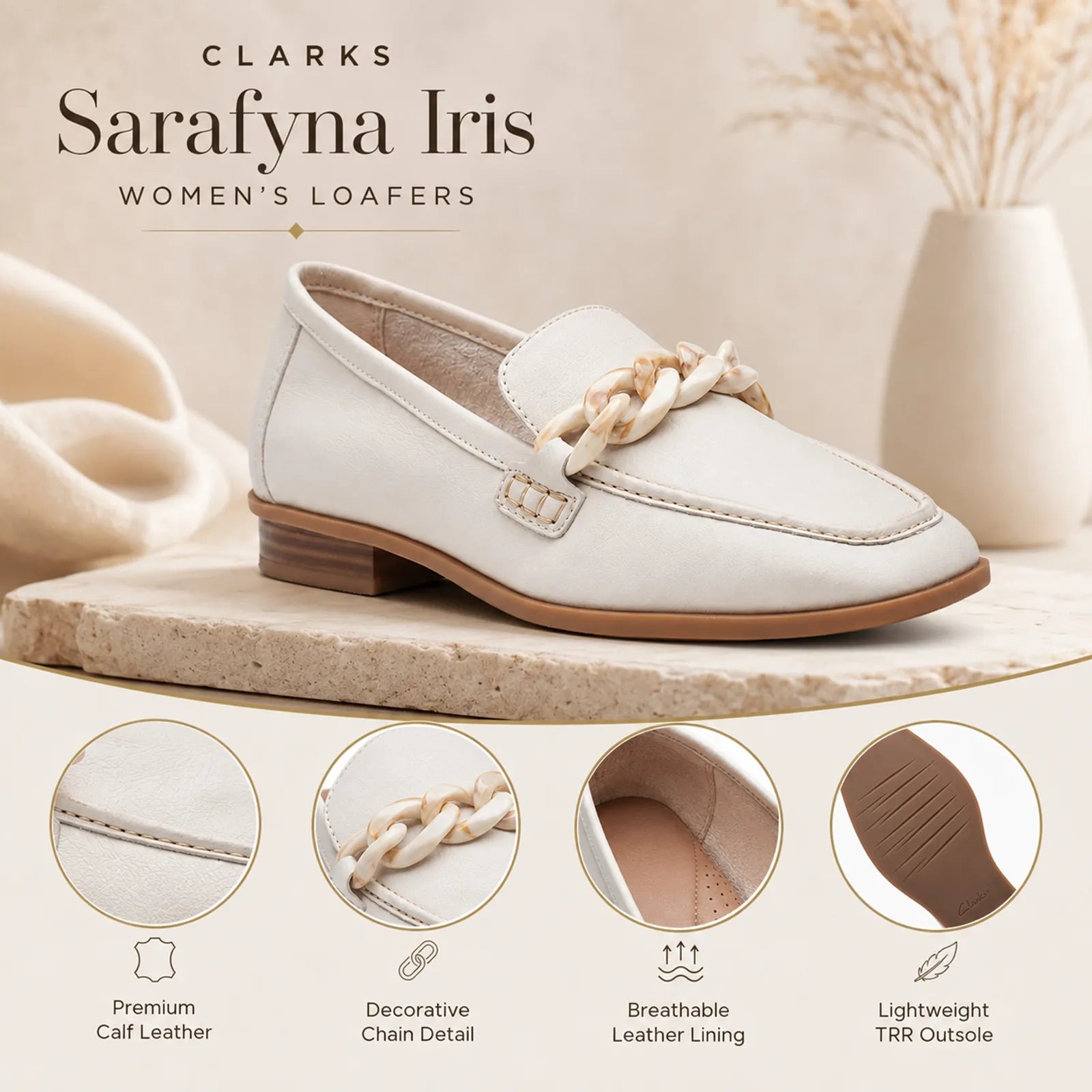 White leather loafers with braided chain detail and low block heel.