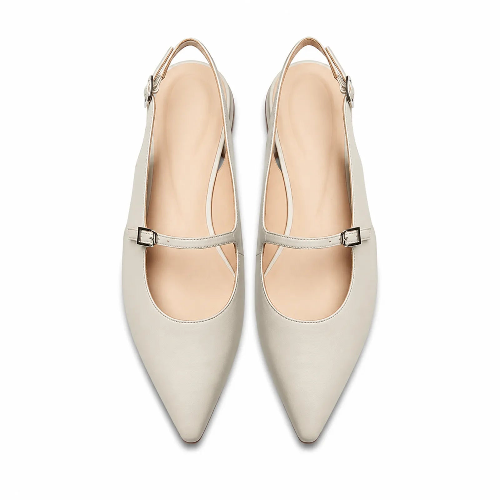 Pair of women's white pointed-toe slingback sandals with buckle strap and low block heel