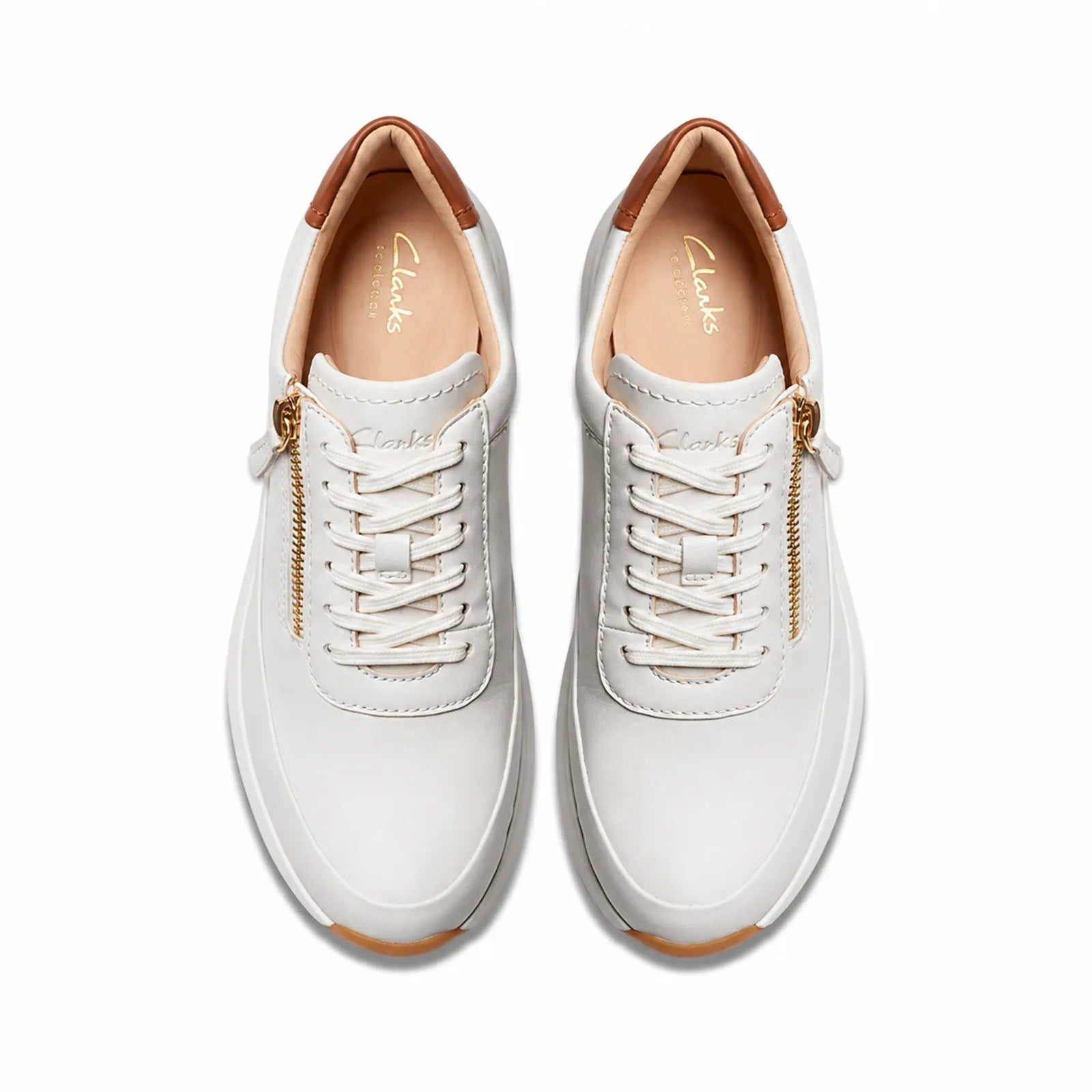 Front view of womens beige leather sneakers with lace-up front and side zip detail