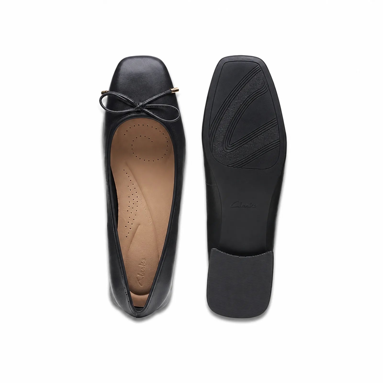 Black women's flats with bow detail, rounded toe; outsole tread shown