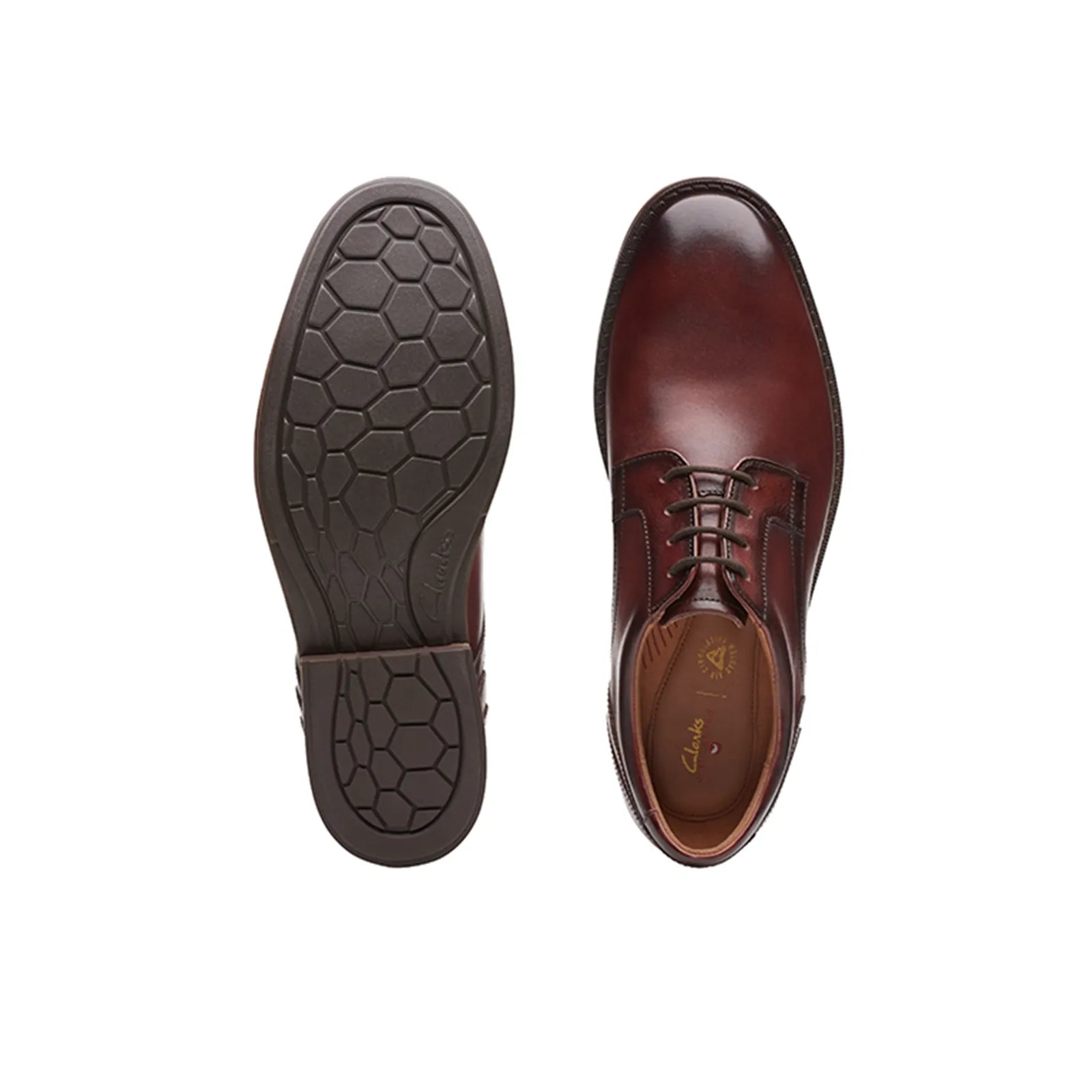 Brown dress shoe outsole and side view with hex-pattern tread and lace upper