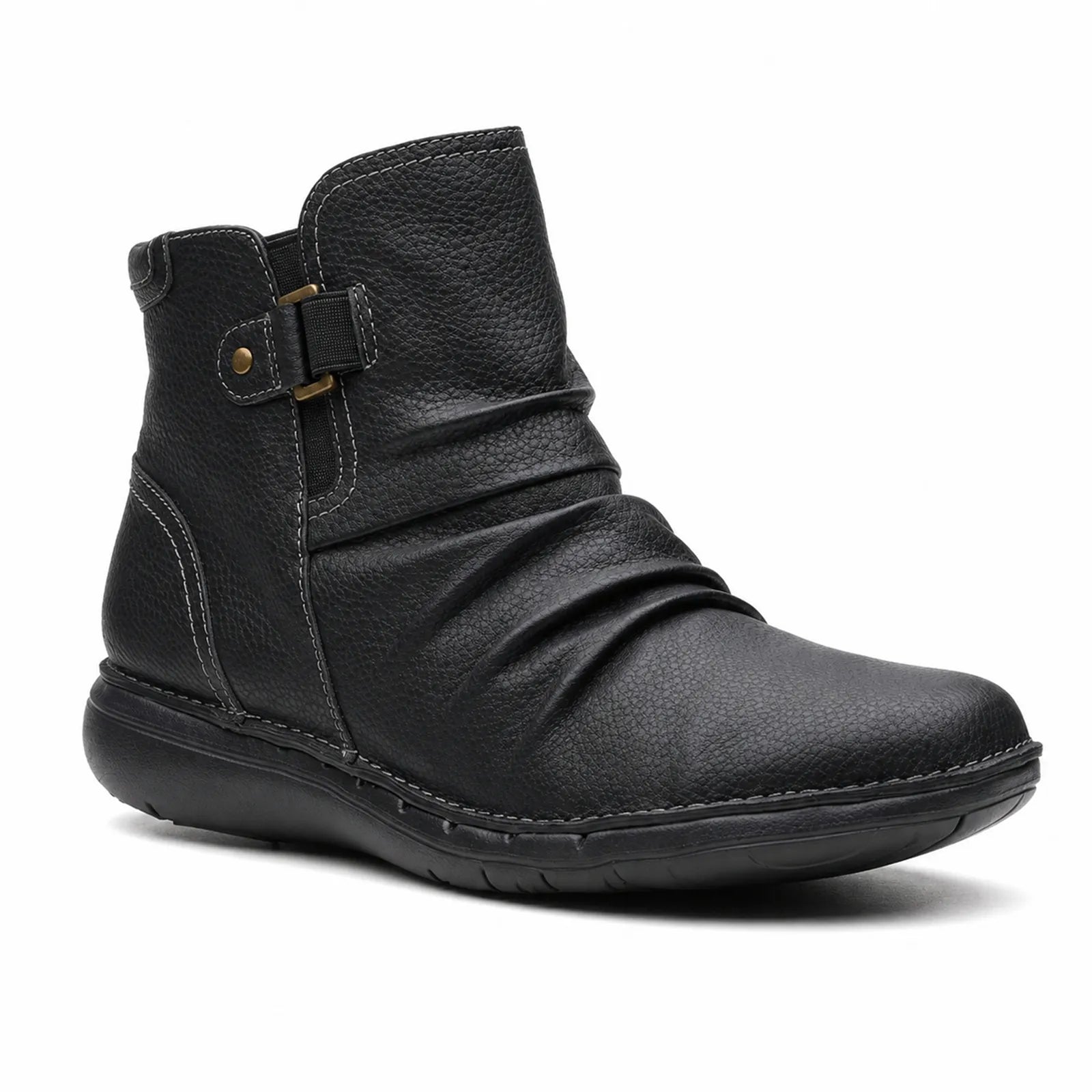 Women's black leather ankle boots with buckle strap and low-profile sole