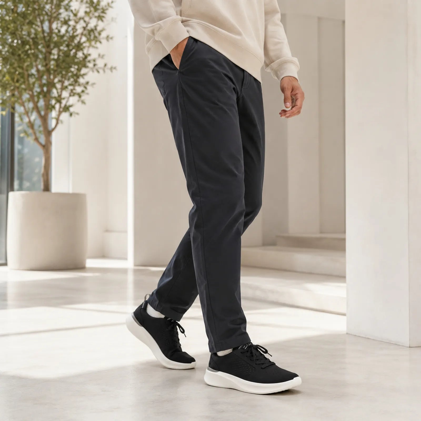 Men's black lace-up sneakers with textured upper and white outsole