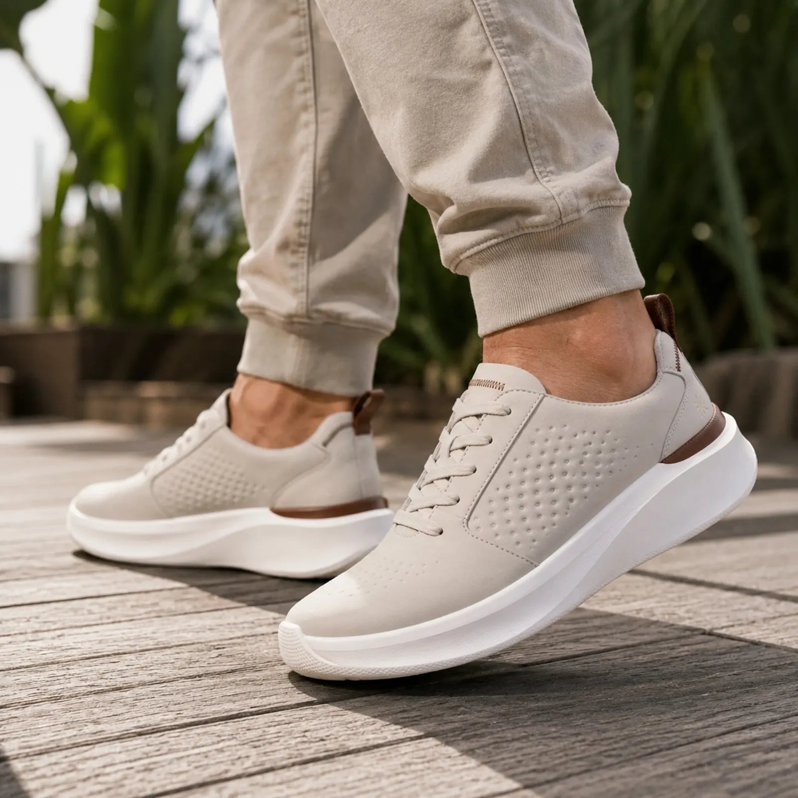 Men's off-white lace-up sneakers with textured upper and white sole