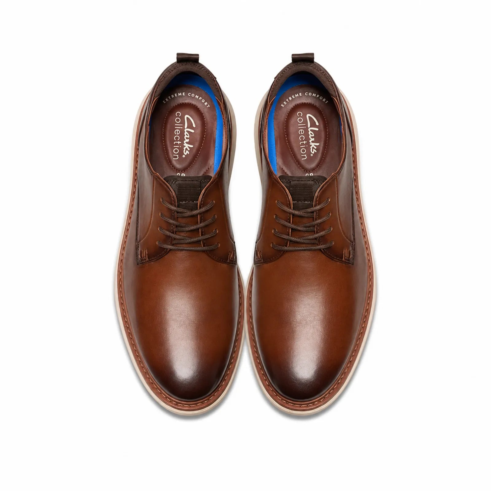 Pair of men's leather lace-up shoes, brown uppers with tan-edge sole