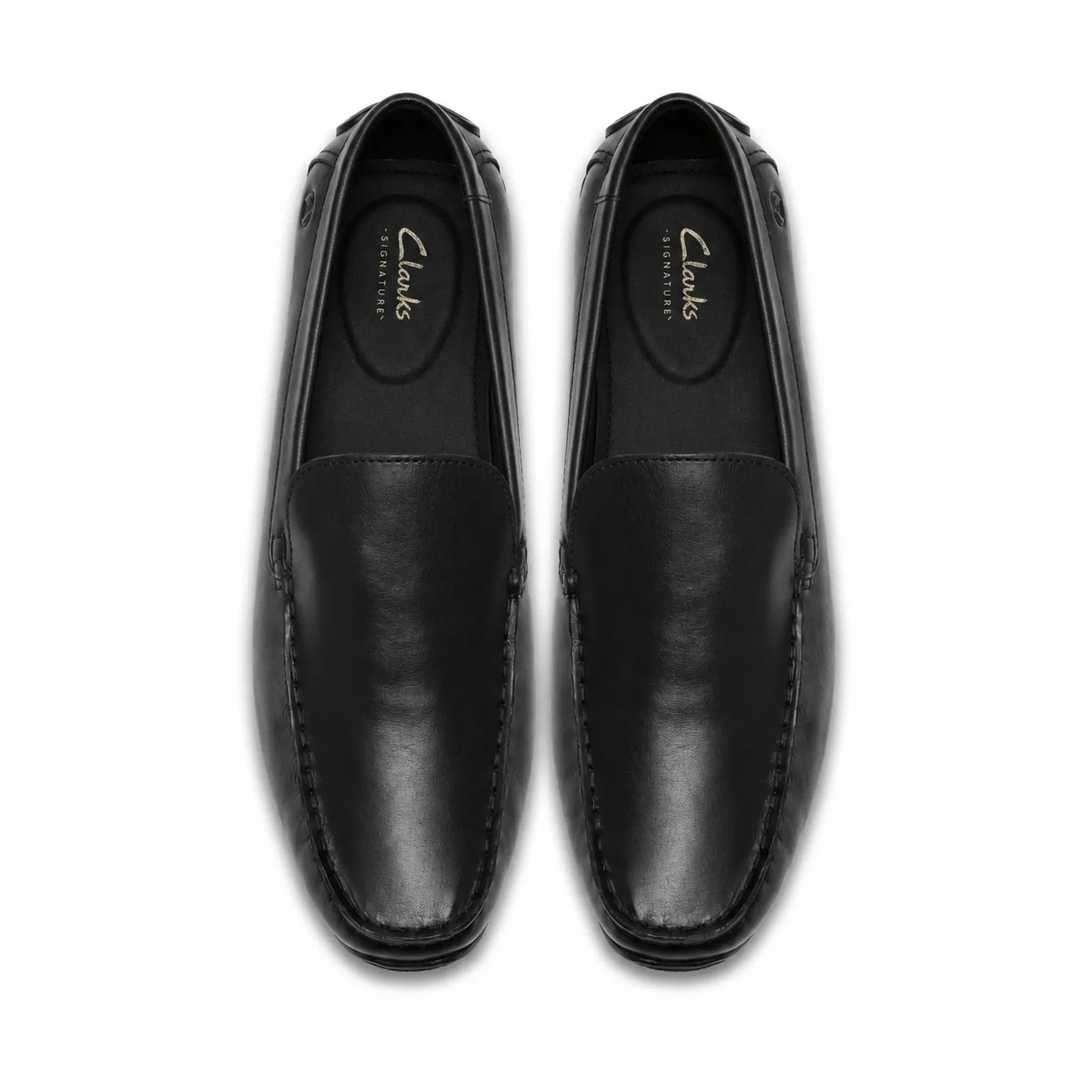 Side view of Clarks Corsley Plain men's black leather loafers with flexible podded rubber sole