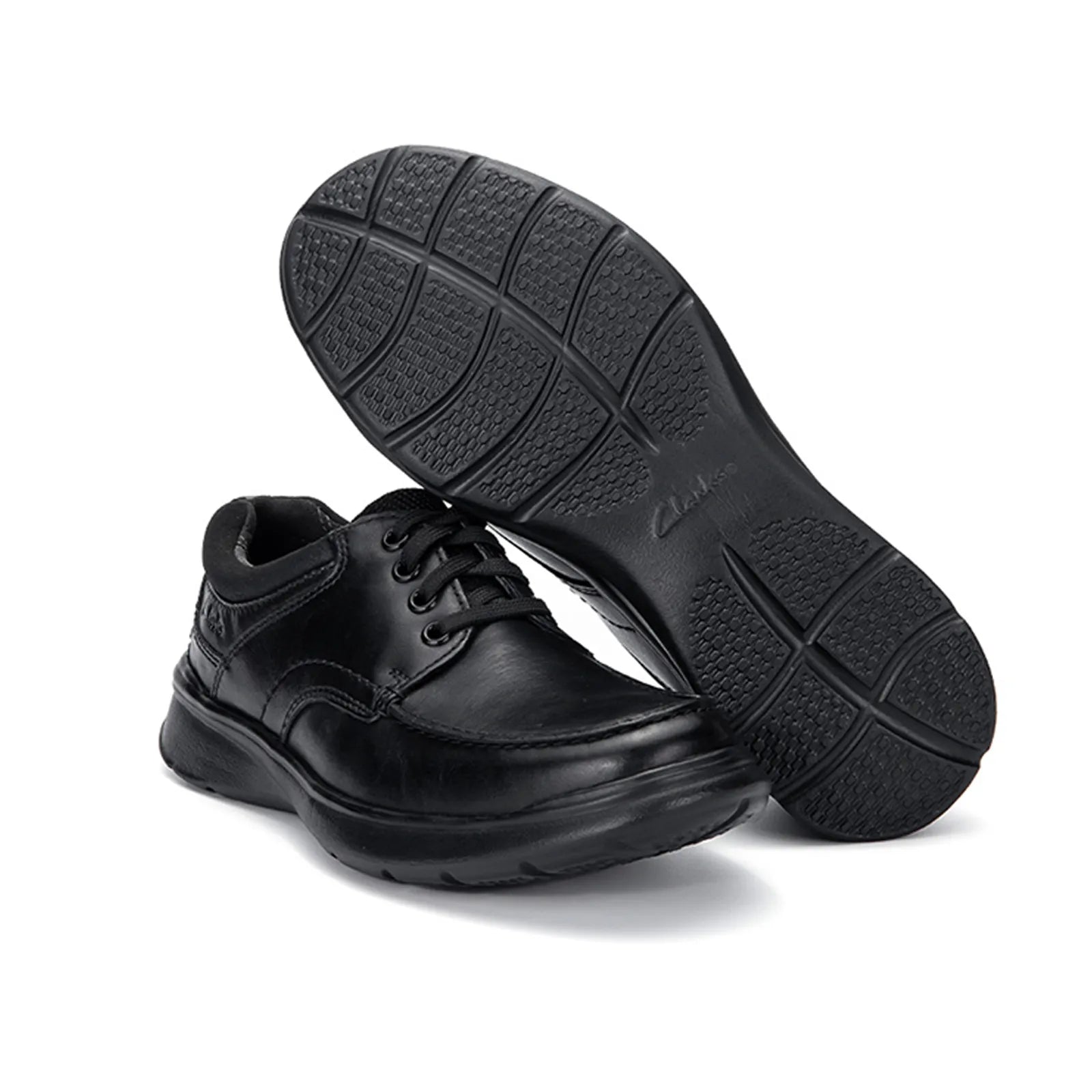 Men’s black leather lace-up shoe with textured outsole, angled view