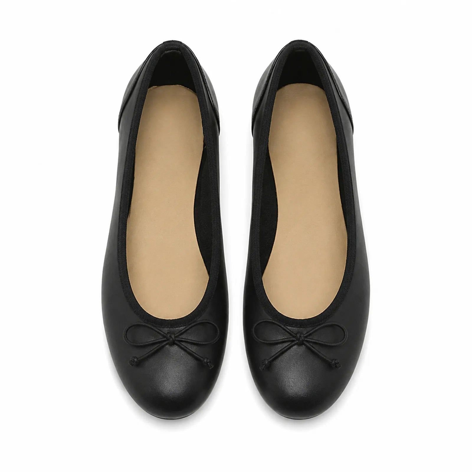 Pair of black leather ballet flats with bow ties, low heel