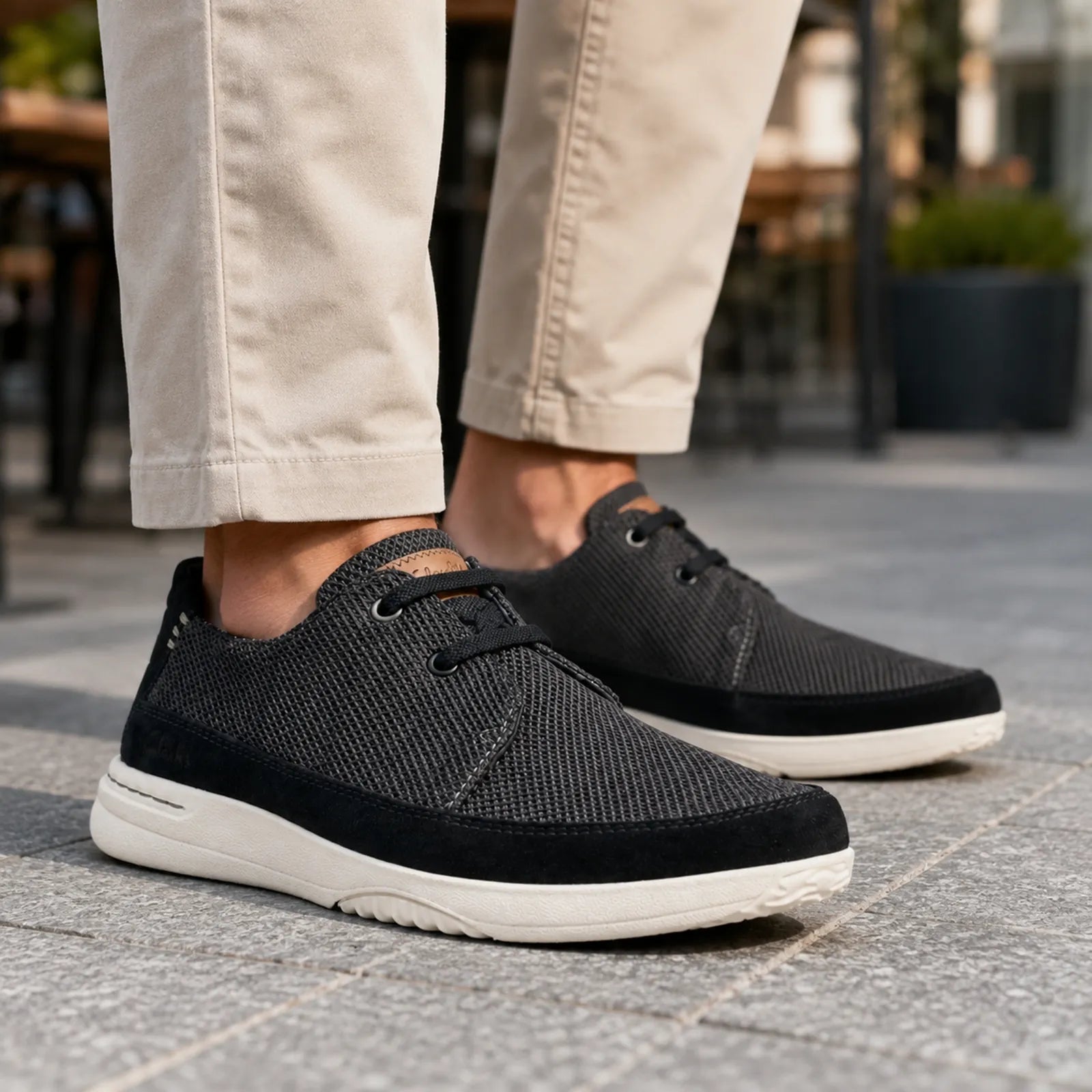 Clarks Easeway Lace black combi sneakers shown on foot for comfortable everyday walking