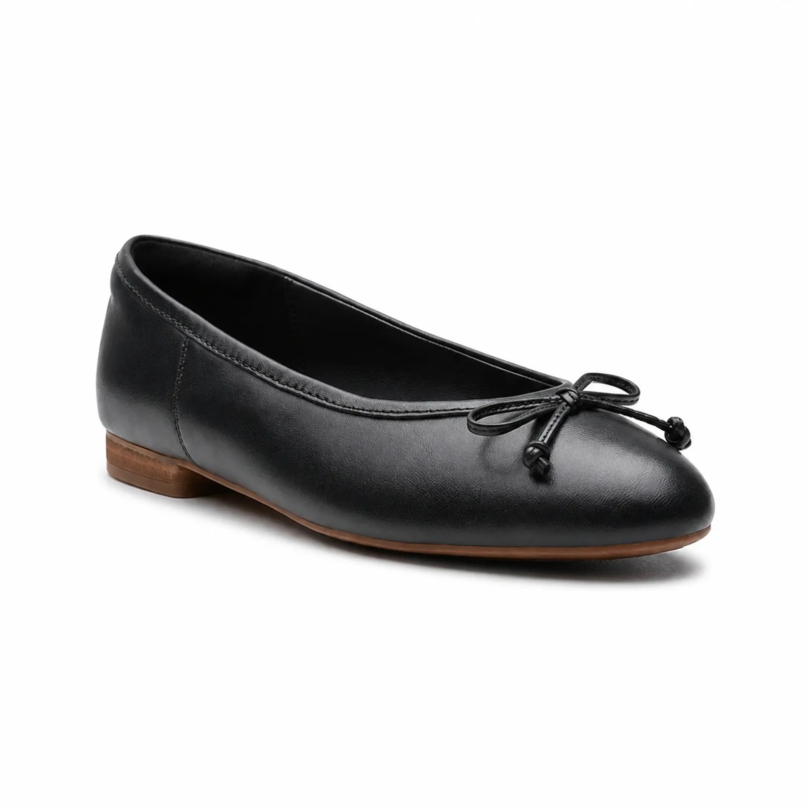 Women’s black leather loafer flats with bow-tie tassel detail and low brown heel