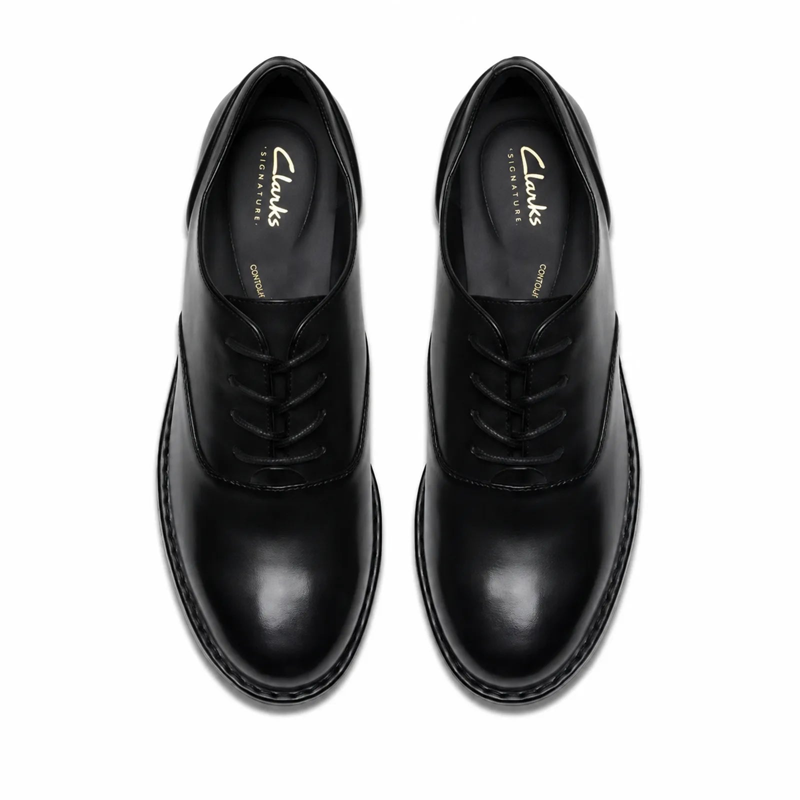 Pair of black leather lace-up oxford shoes, tongue and laces visible
