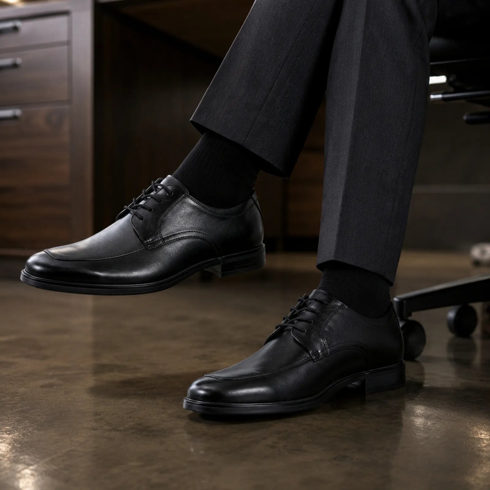 Men's black leather lace-up dress shoes with textured sole