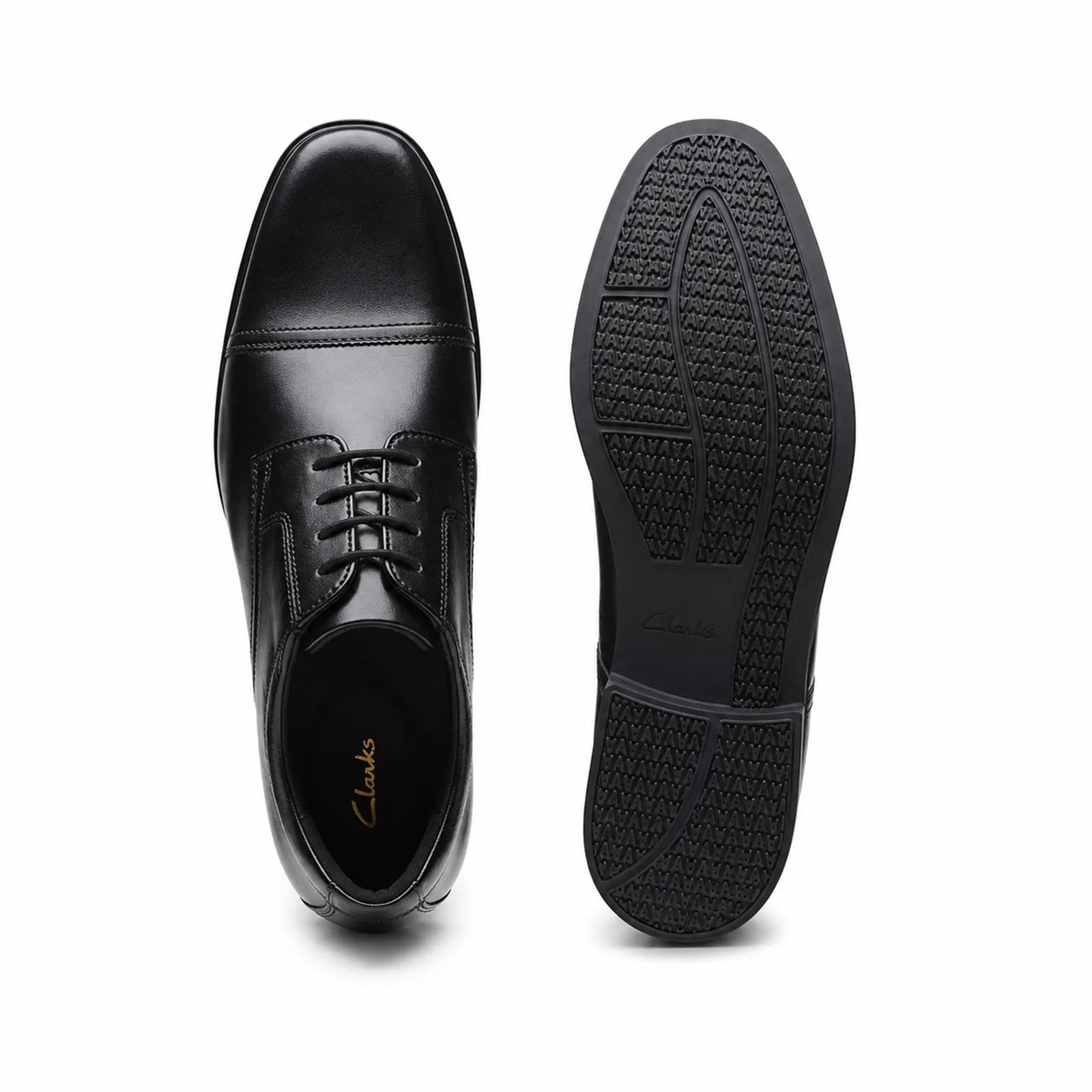 Men's black leather shoe view with treaded rubber outsole