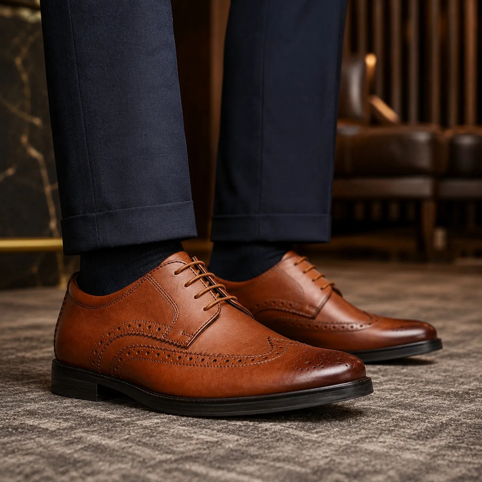 Dark brown leather wingtip brogue derby shoes with lace-up closure