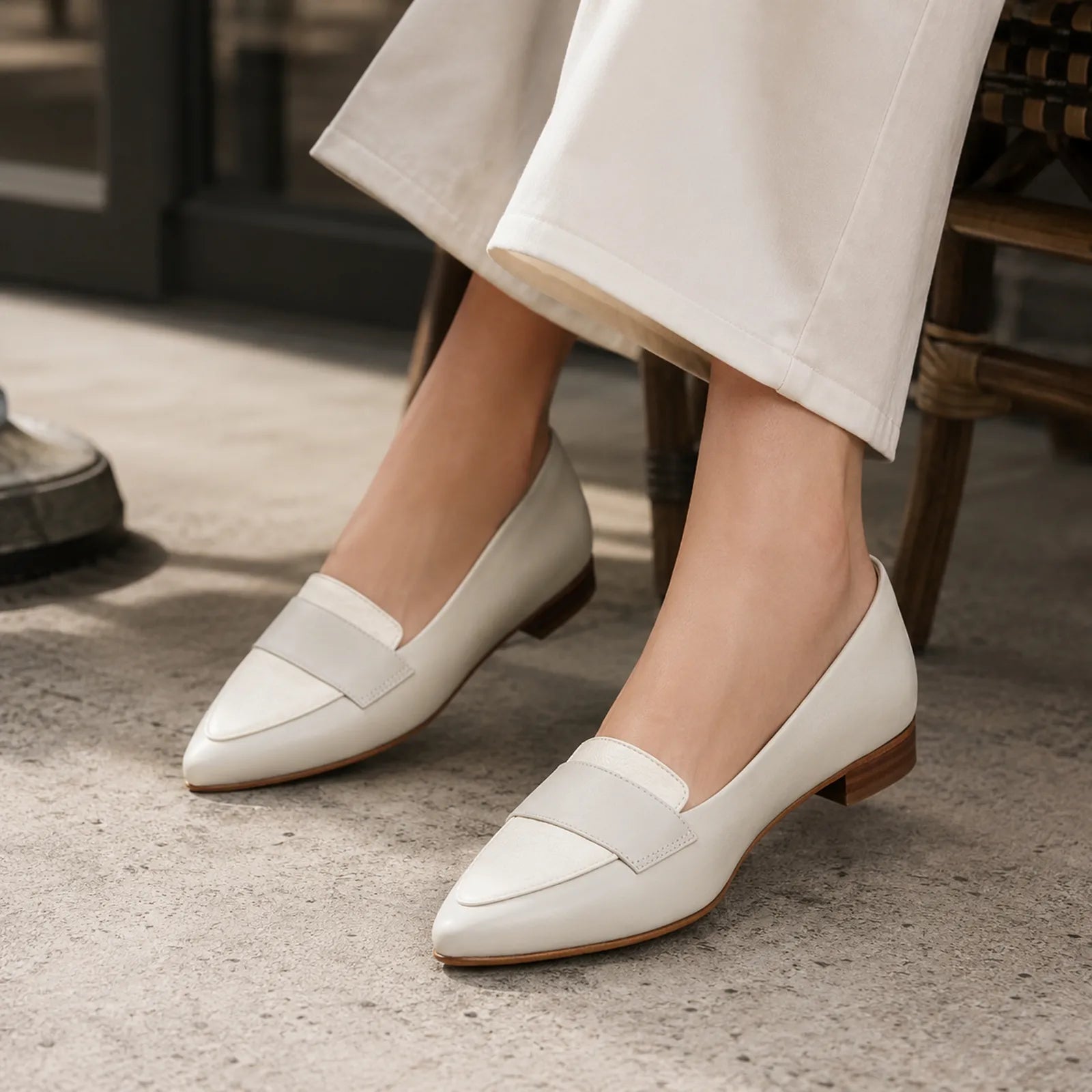 White leather women's loafers with strap detail and low block heel
