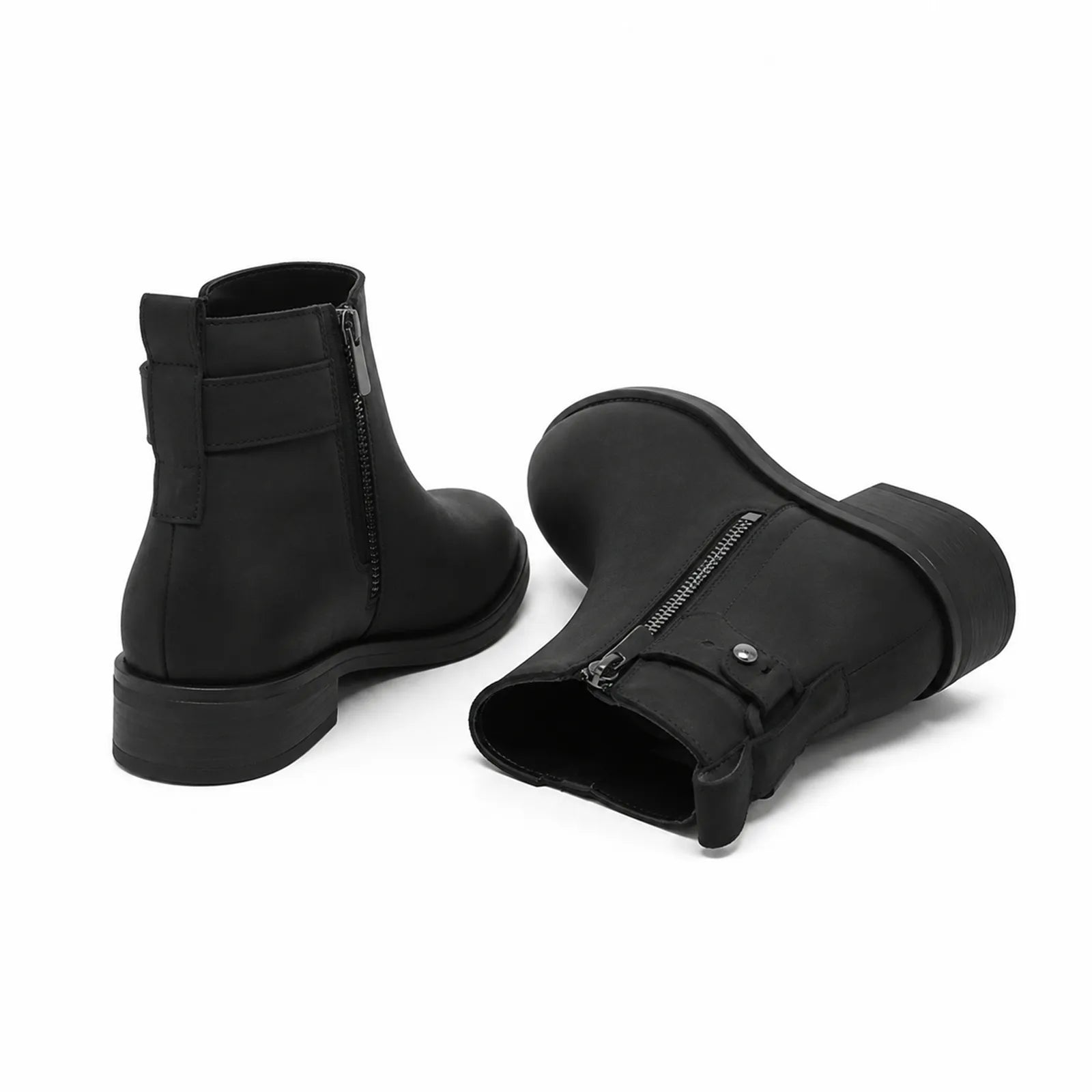 Black leather ankle boots with side zip and treaded rubber outsole