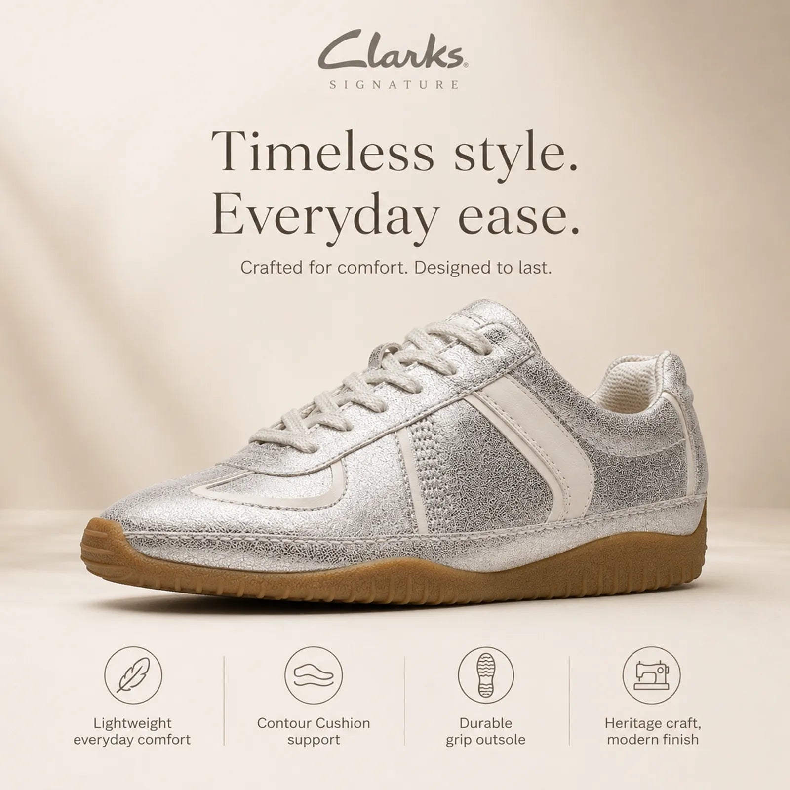Metallic silver lace-up leather sneaker with off-white trim and gum rubber outsole