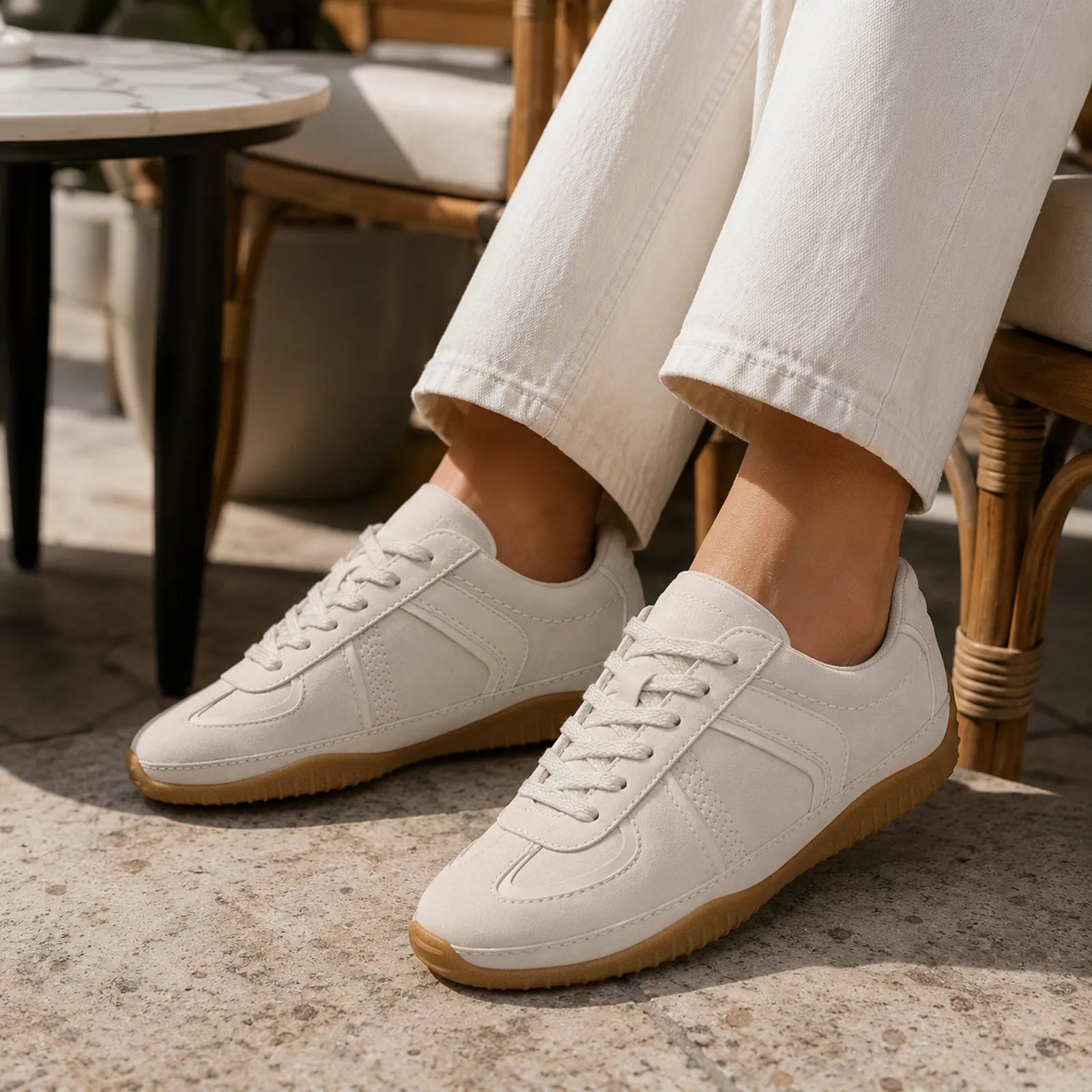 Off-white leather sneakers with lace-up and gum rubber soles