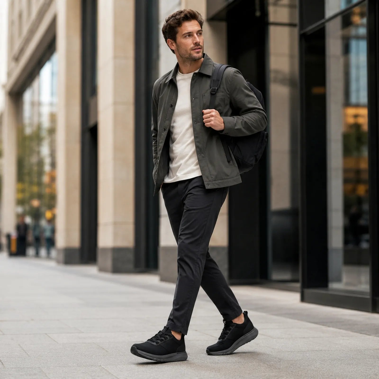 Man wearing Clarks Motion Trek LX black sneakers for casual walking and athleisure style