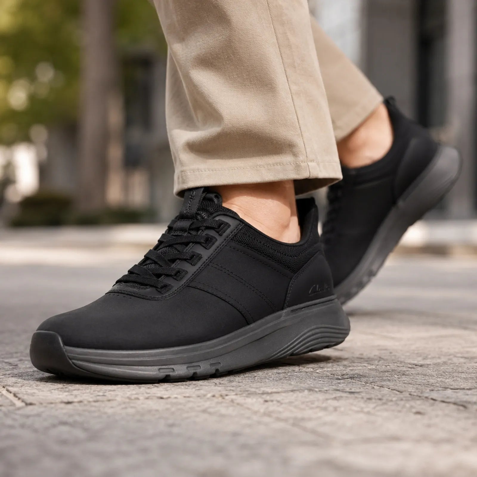Clarks Motion Trek LX black sneakers shown on foot for comfortable everyday walking
