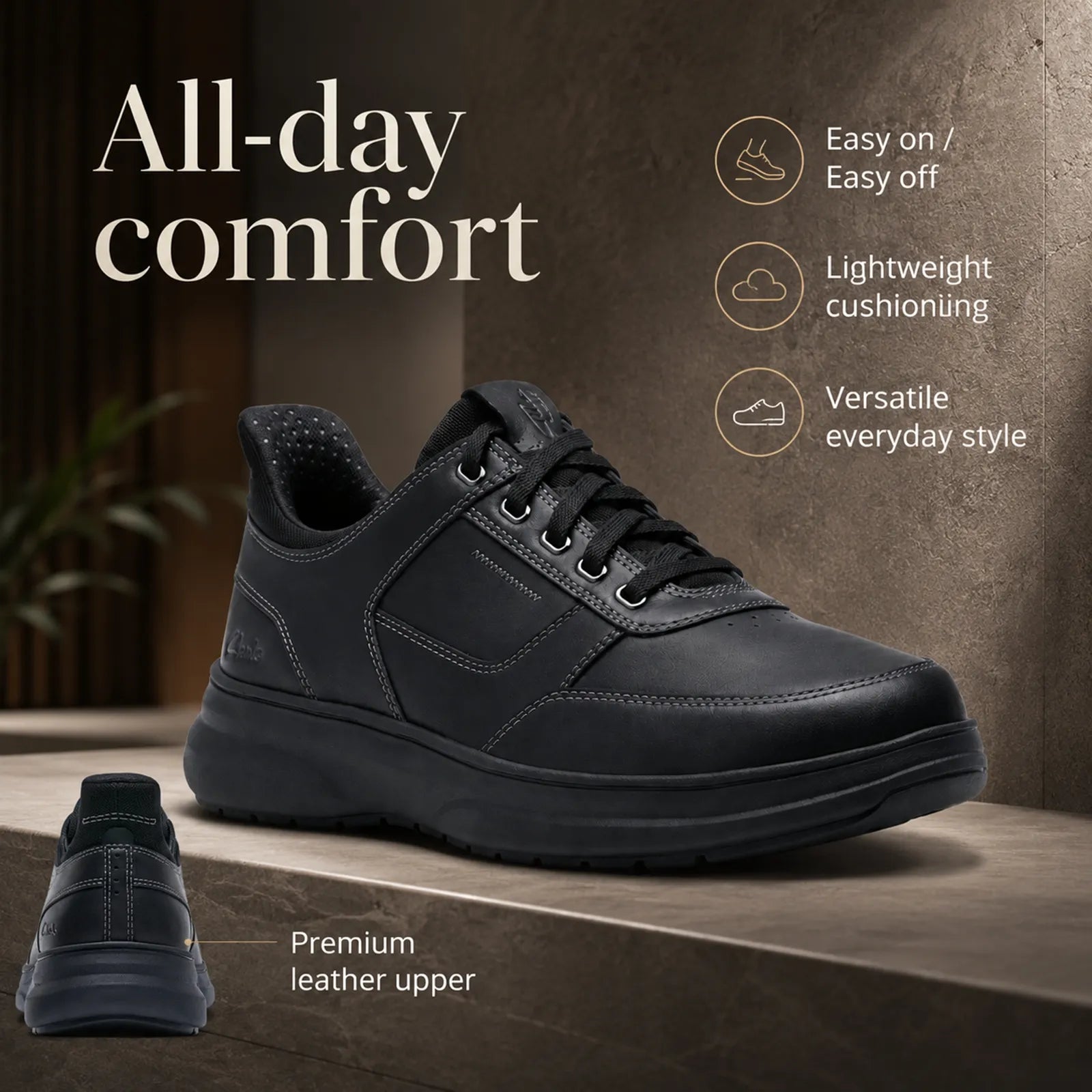 Black leather lace-up sneakers with padded tongue and cushioned sole