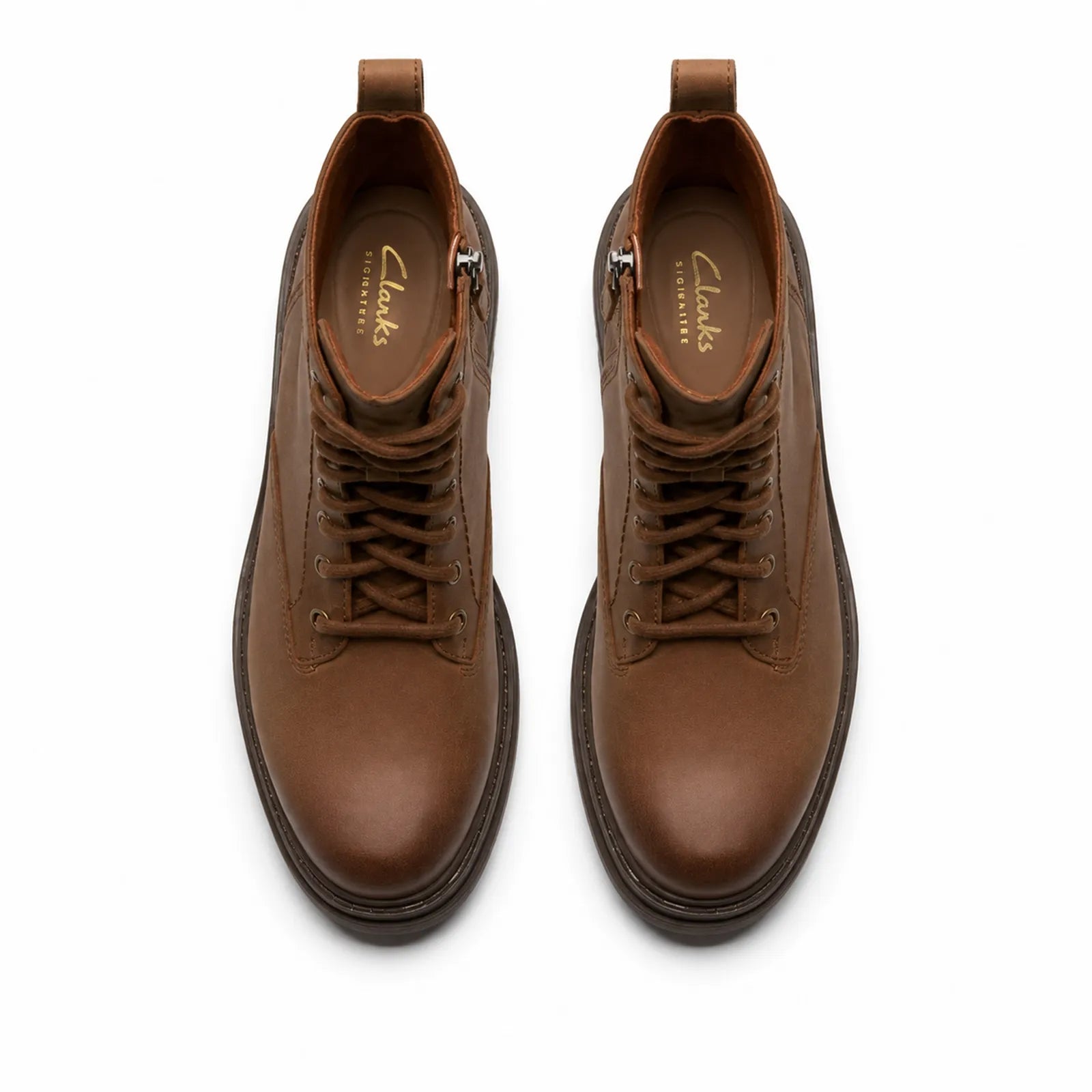 Pair of women's brown leather lace-up ankle boots, front view