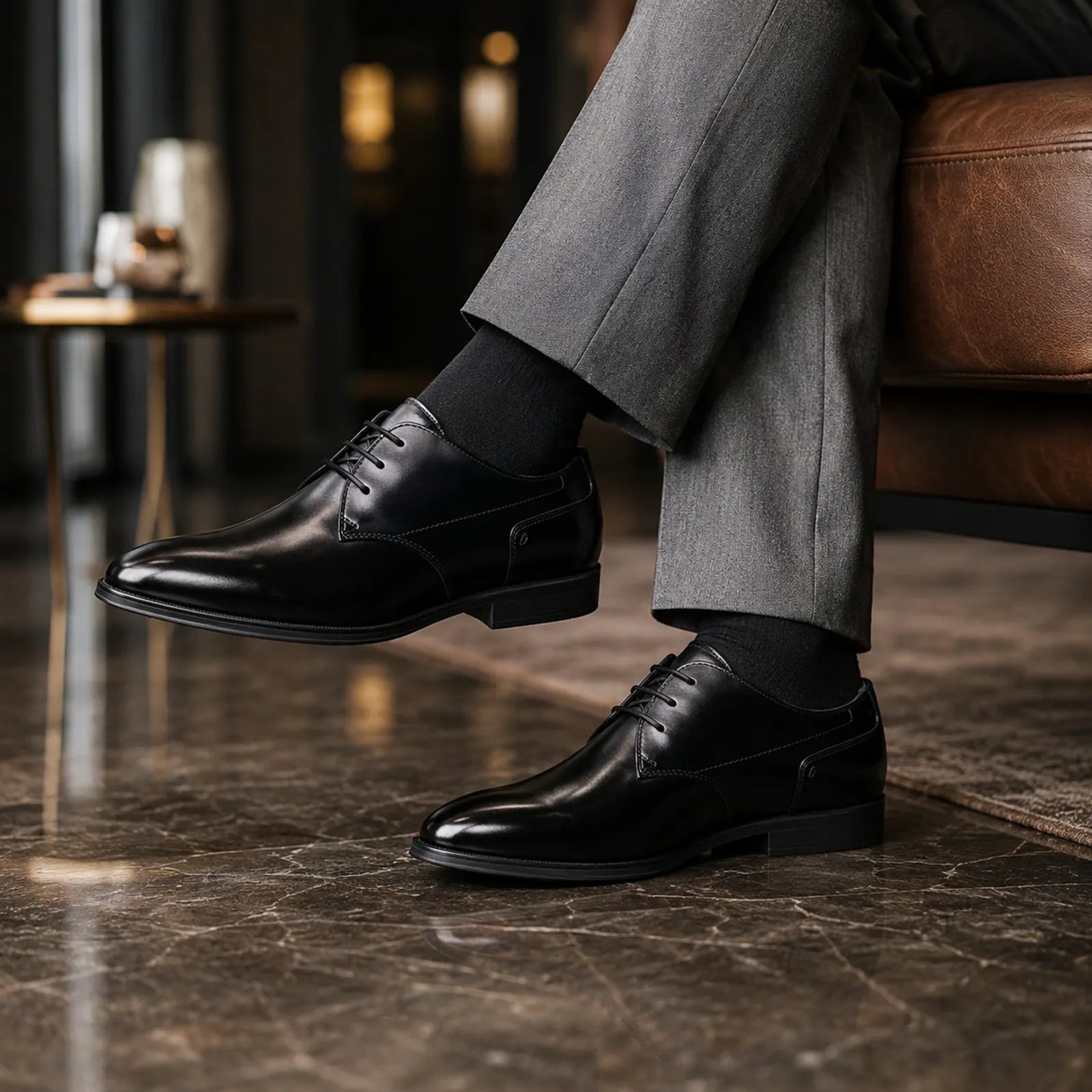 Black lace-up leather dress shoes with low block heel, side view