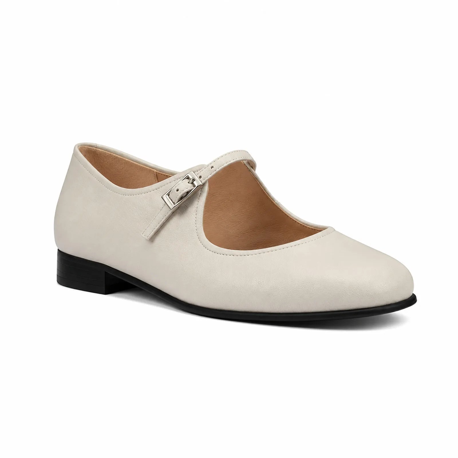 White women's flat loafer with buckled strap and black rubber sole