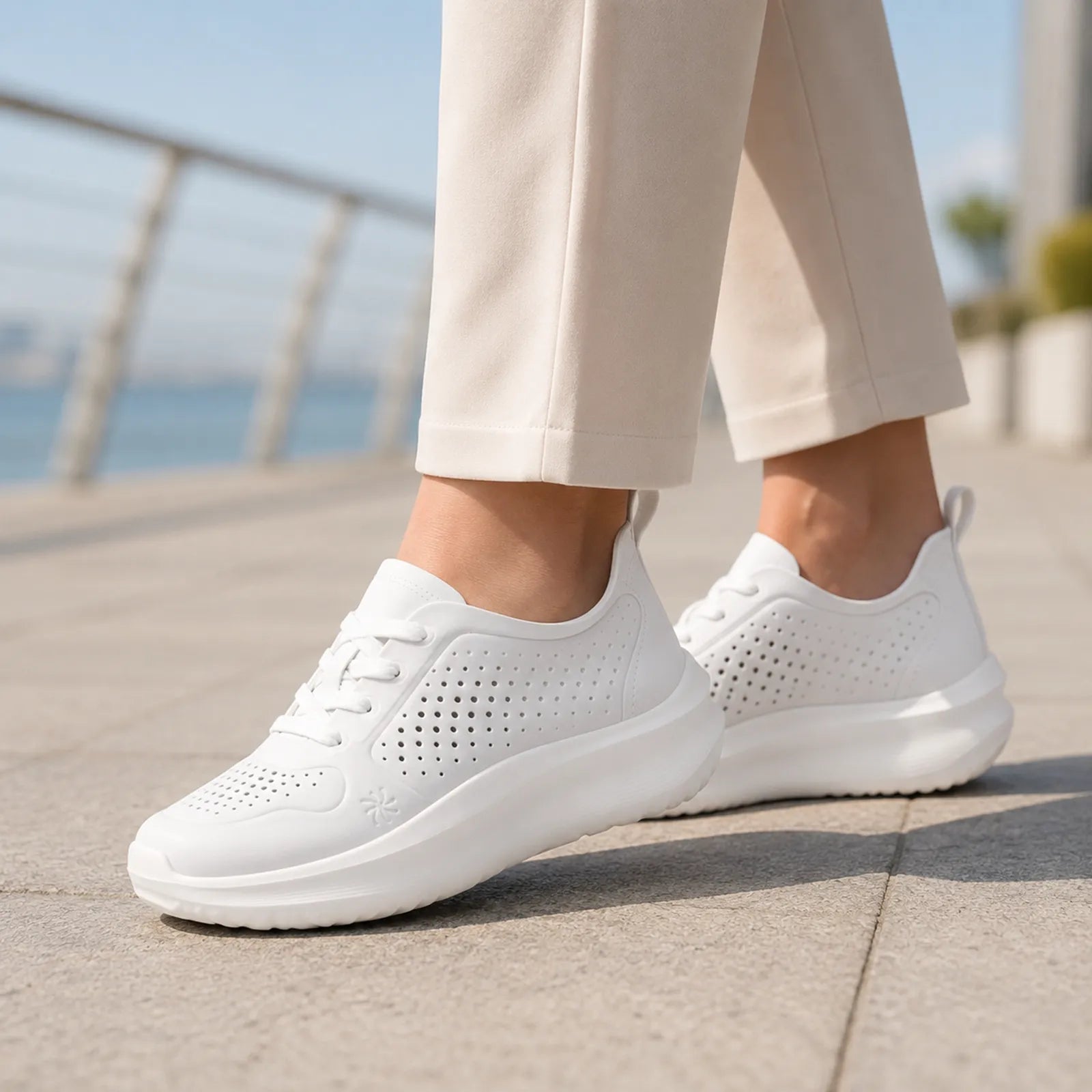 Off-white women’s tie sneakers with perforated sides and low-profile sole