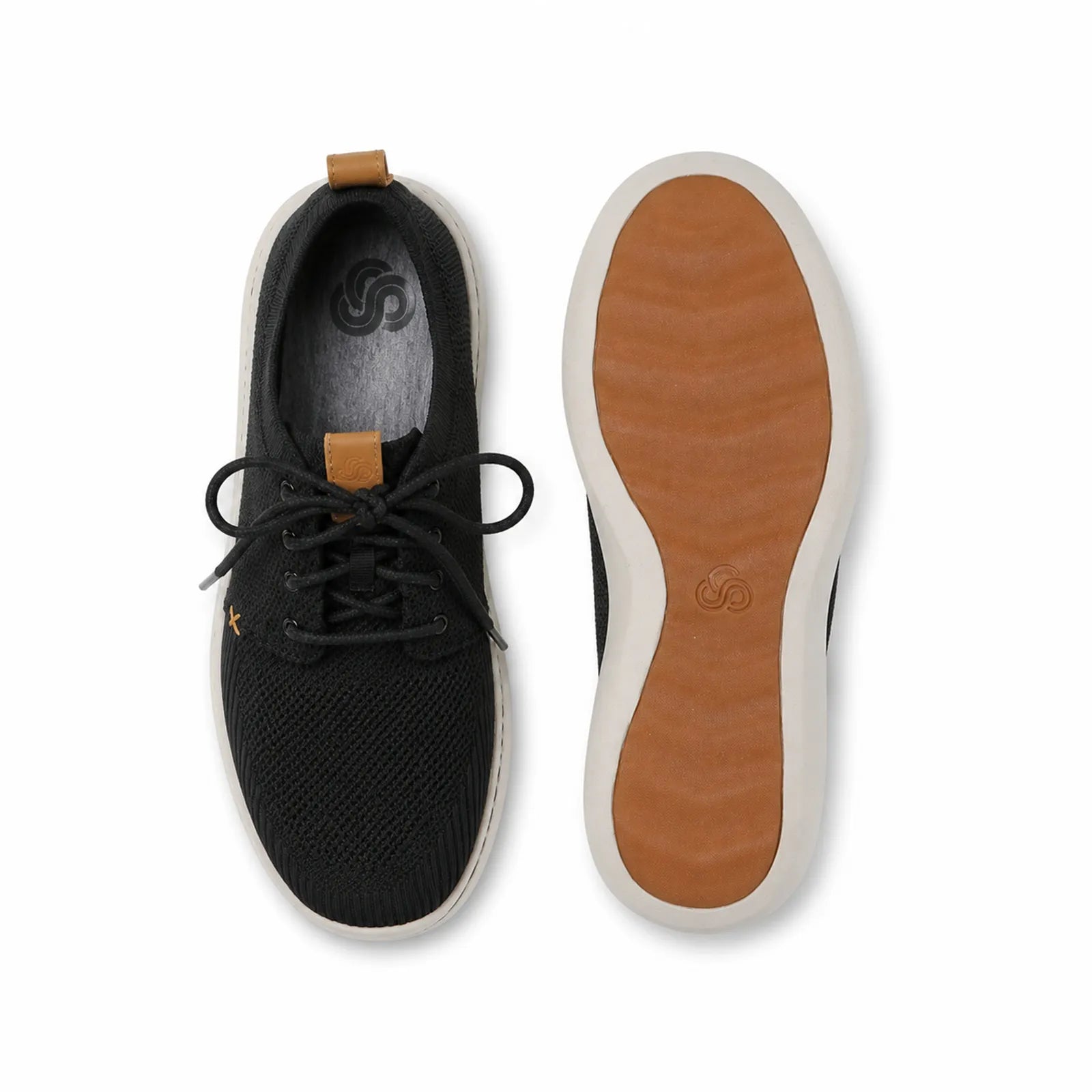 Pair of black lace-up sneakers with tan insoles, textured knit upper