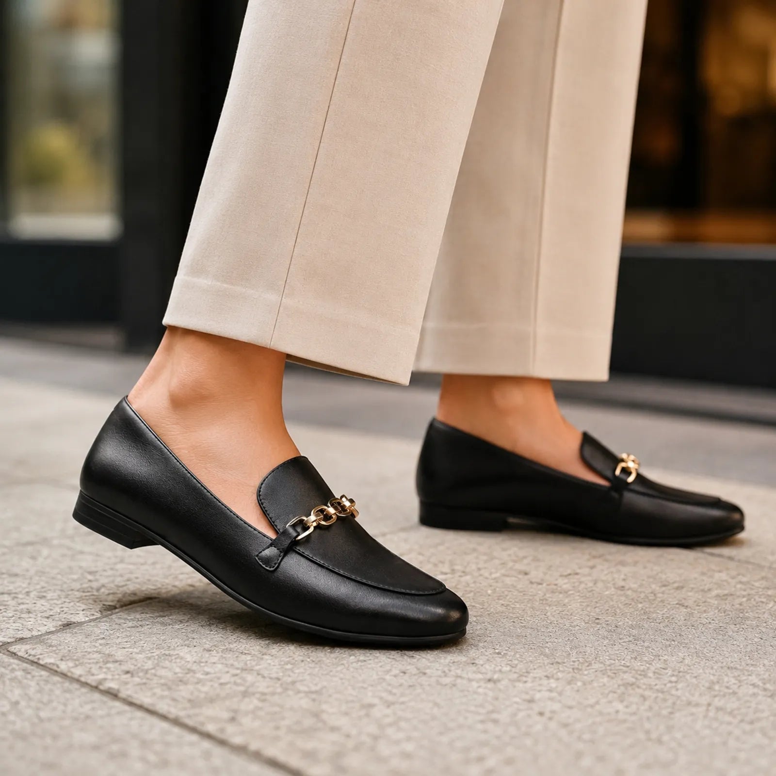 Clarks Tamna Iris black leather loafers shown on foot for everyday wear