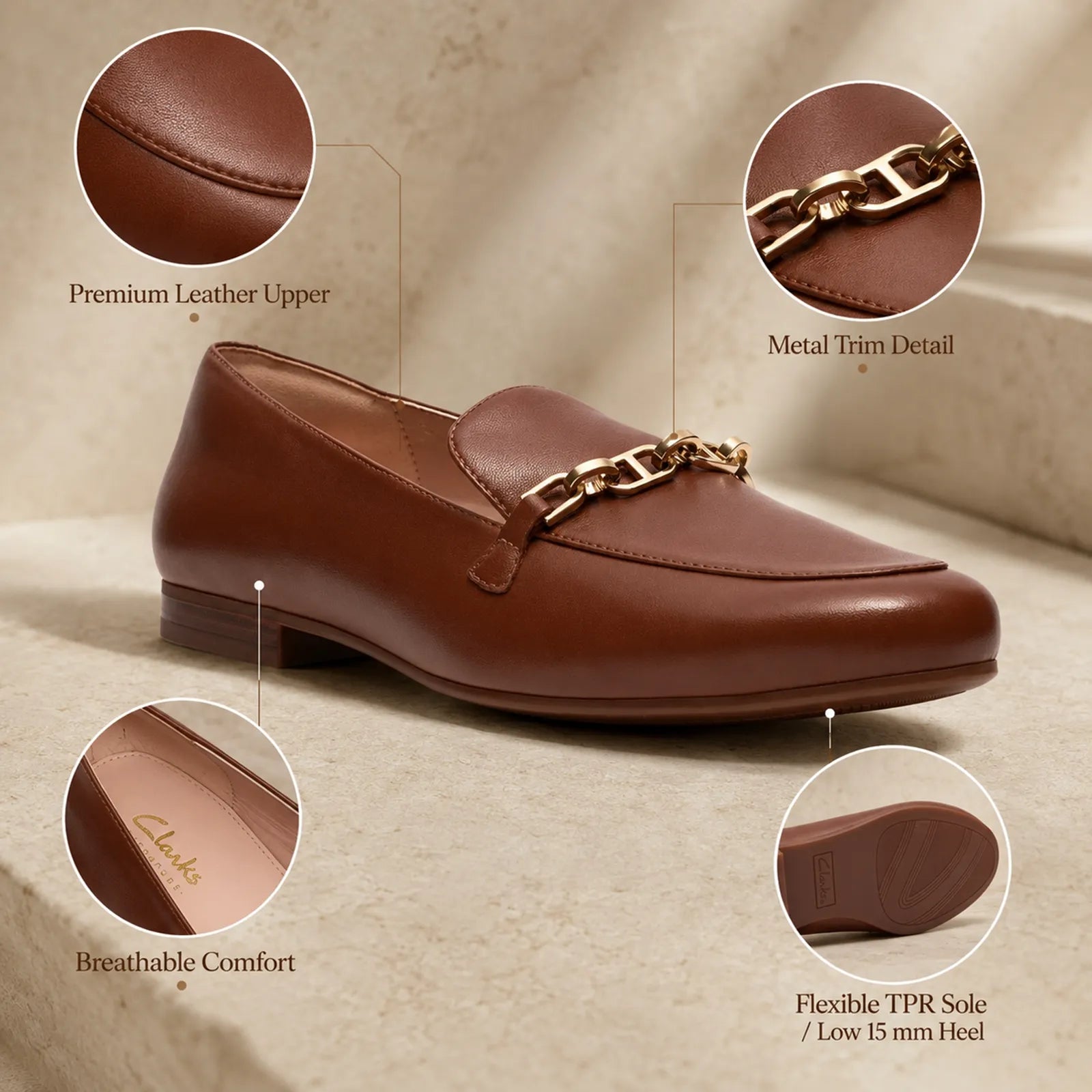 Close-up detail of Clarks Tamna Iris tan leather loafers with premium metal trim