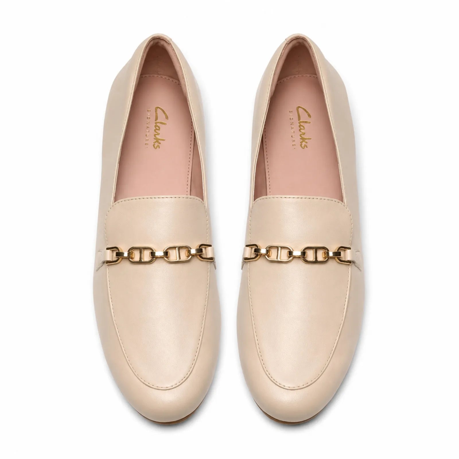 Side view of Clarks Tamna Iris white leather loafers with sleek almond toe shape
