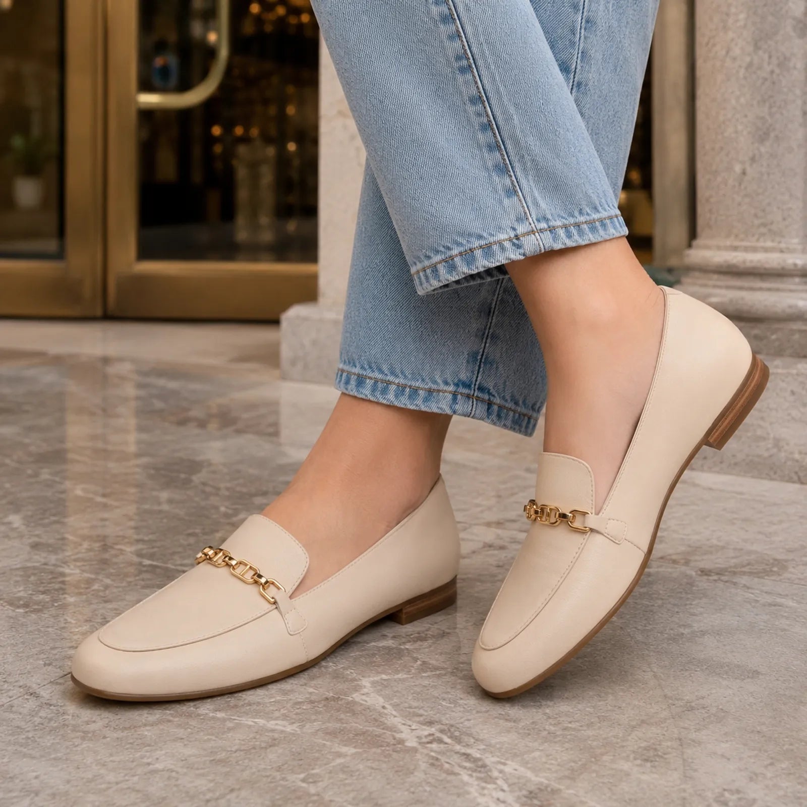 Clarks Tamna Iris white leather loafers shown on foot for comfortable daily wear