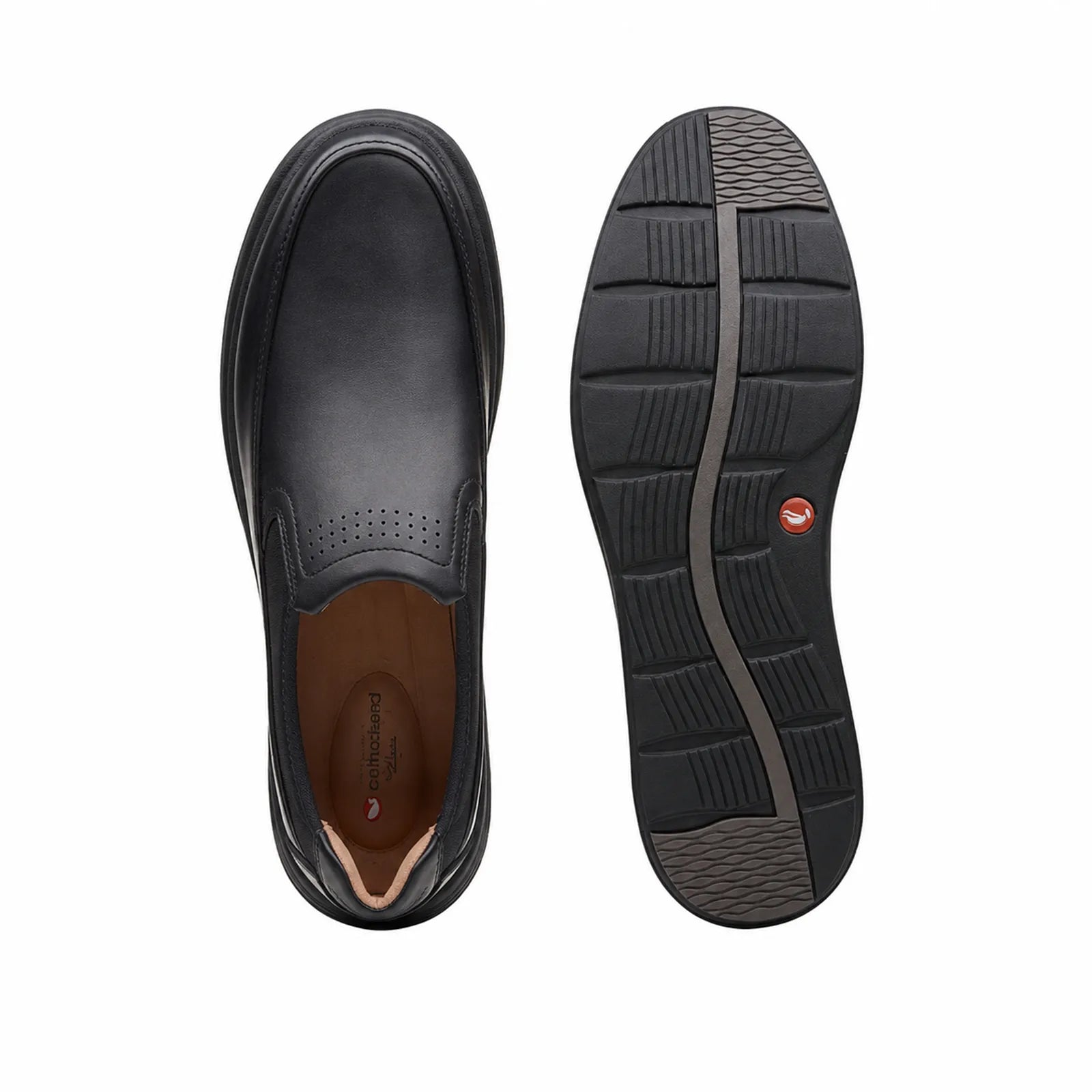 Black leather slip-on shoe: outsole tread and toe view with stitched upper