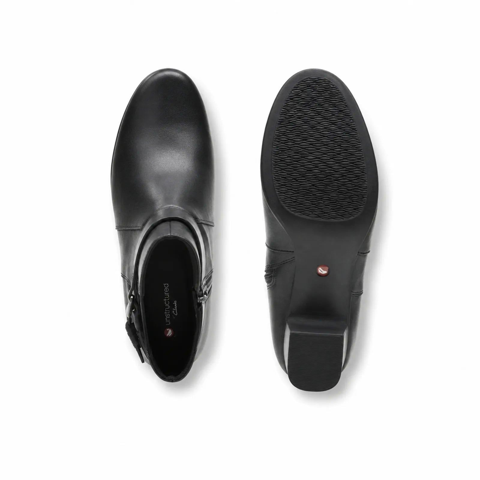 Pair of black leather ankle boots, front and outsole view