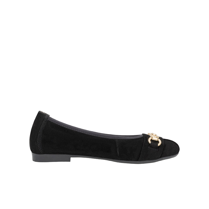 Black women's slip-on pumps with gold buckle detail and low flat heel