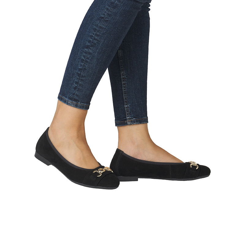 Black suede-look ballet flats with gold buckle and low flat heel