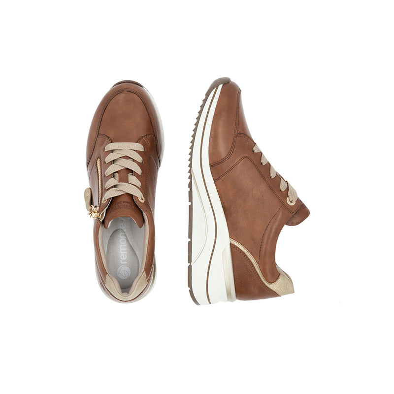 Brown women's sneakers with side zip, gold charm, and textured sole