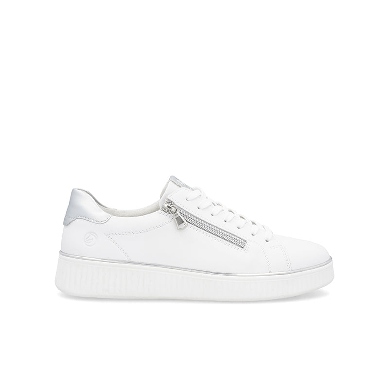 White low-top sneakers with side zip, lace-up front, and thick rubber sole