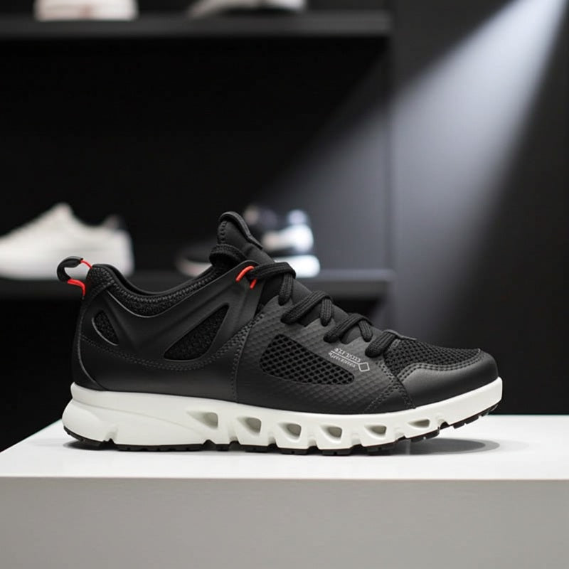 Women’s black lace-up sneakers with cushioned midsole and textured outsole