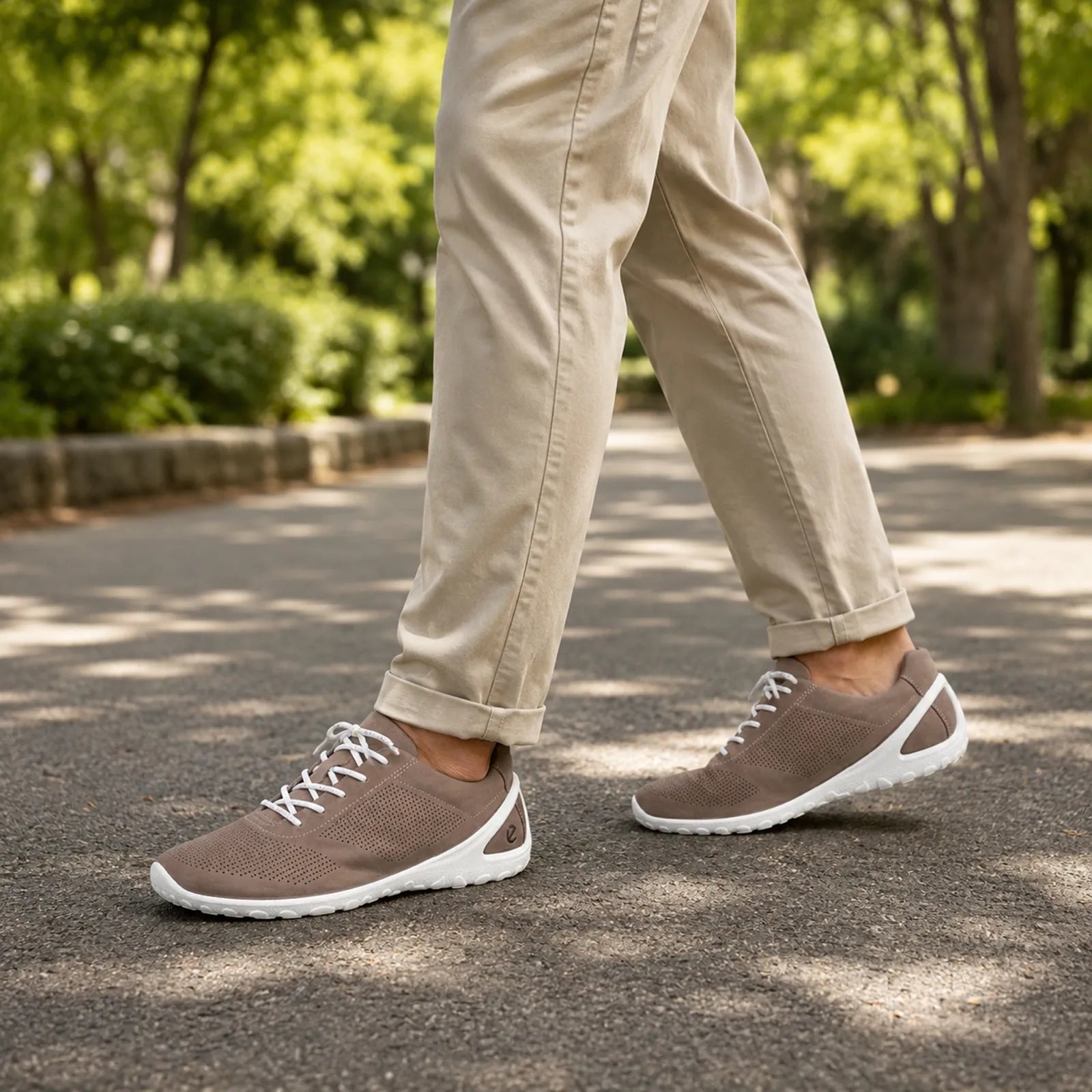 Men's tan lace-up sneakers with white sole and perforated toe